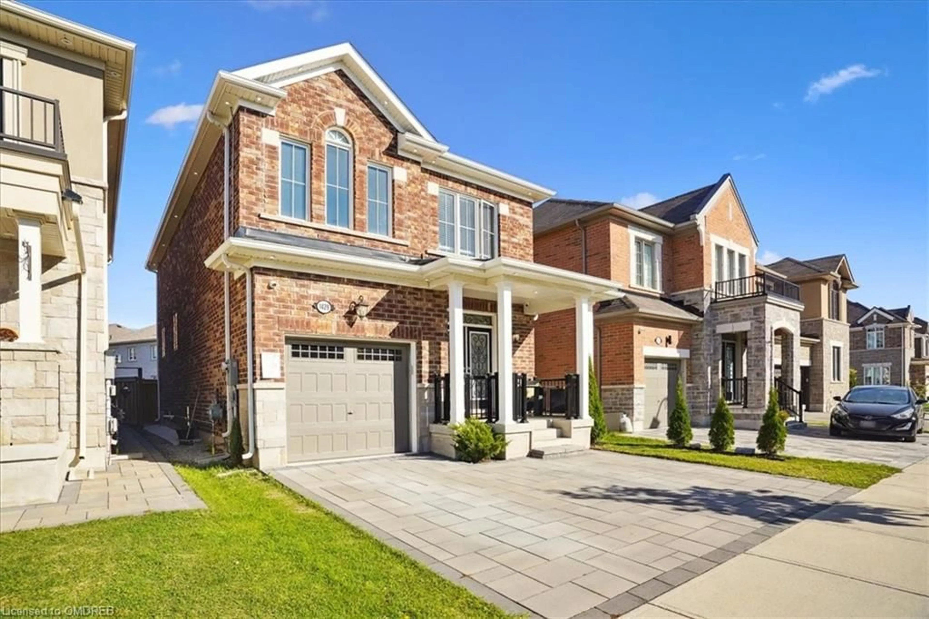 Home with brick exterior material for 1429 Sycamore Garden, Milton Ontario L9T 7E7