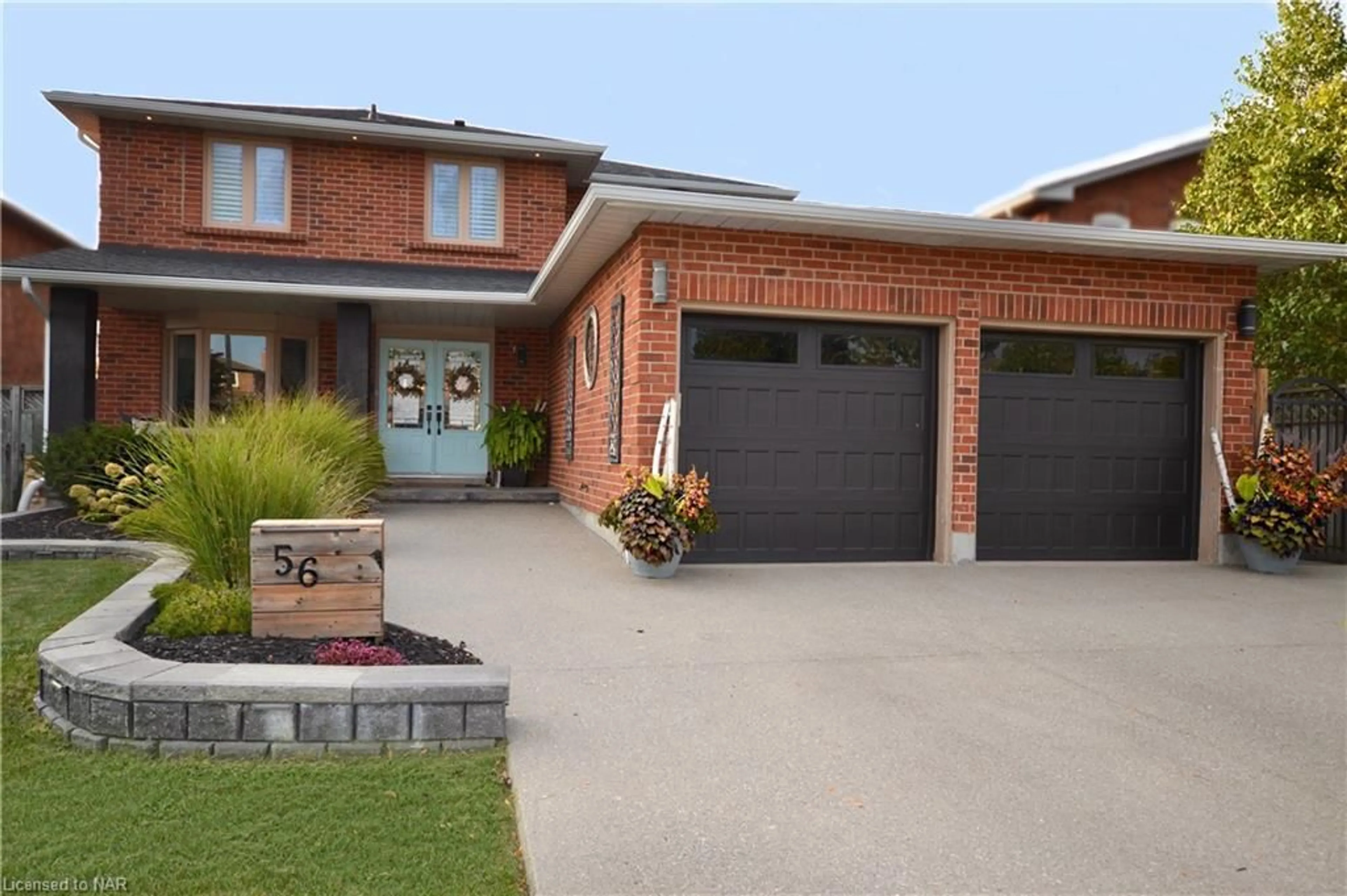 Home with brick exterior material for 56 Barbican Trail, St. Catharines Ontario L2T 4A6