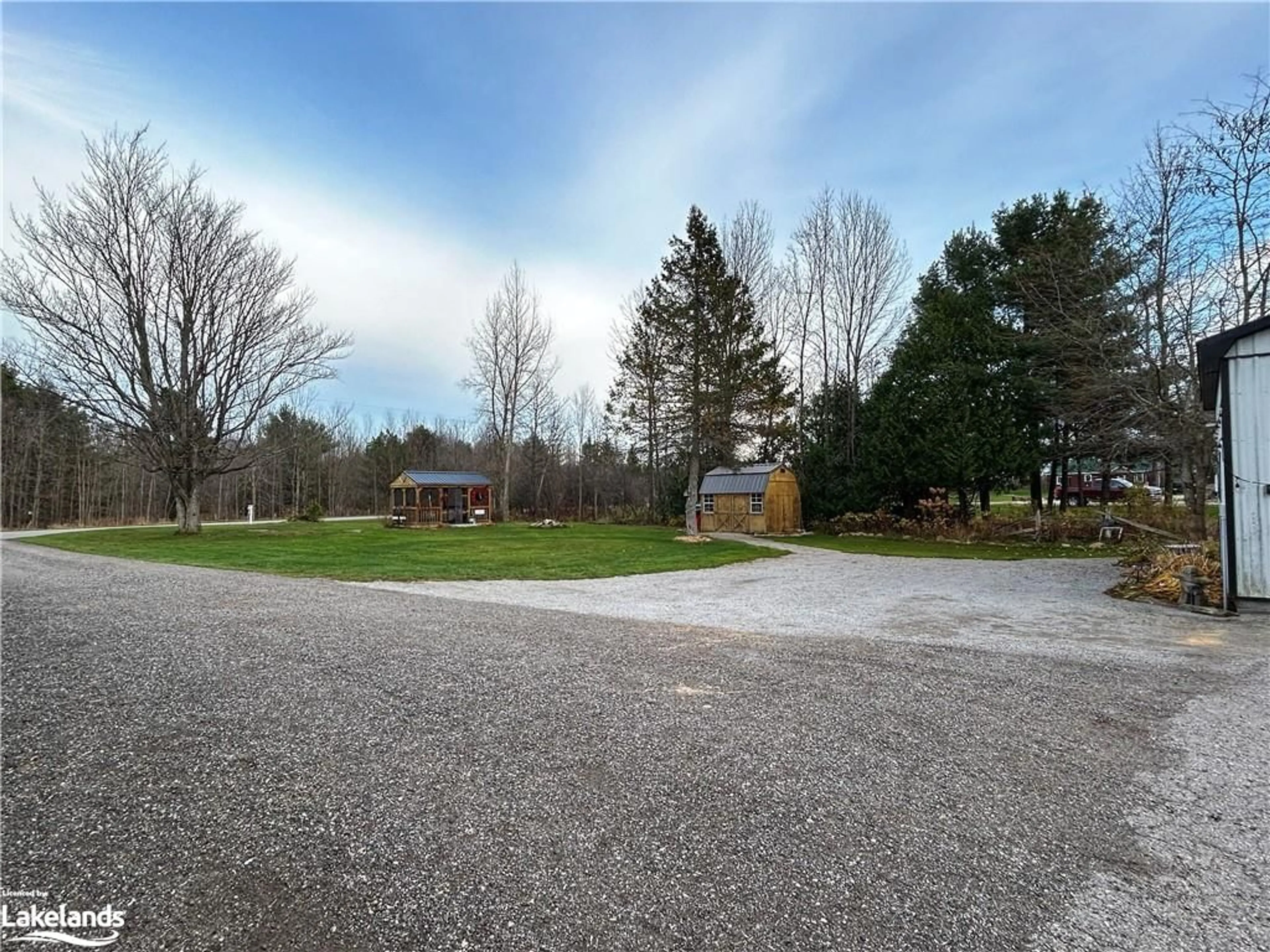 Frontside or backside of a home, the fenced backyard for 2066 Irish Line, Coldwater Ontario L0K 1E0