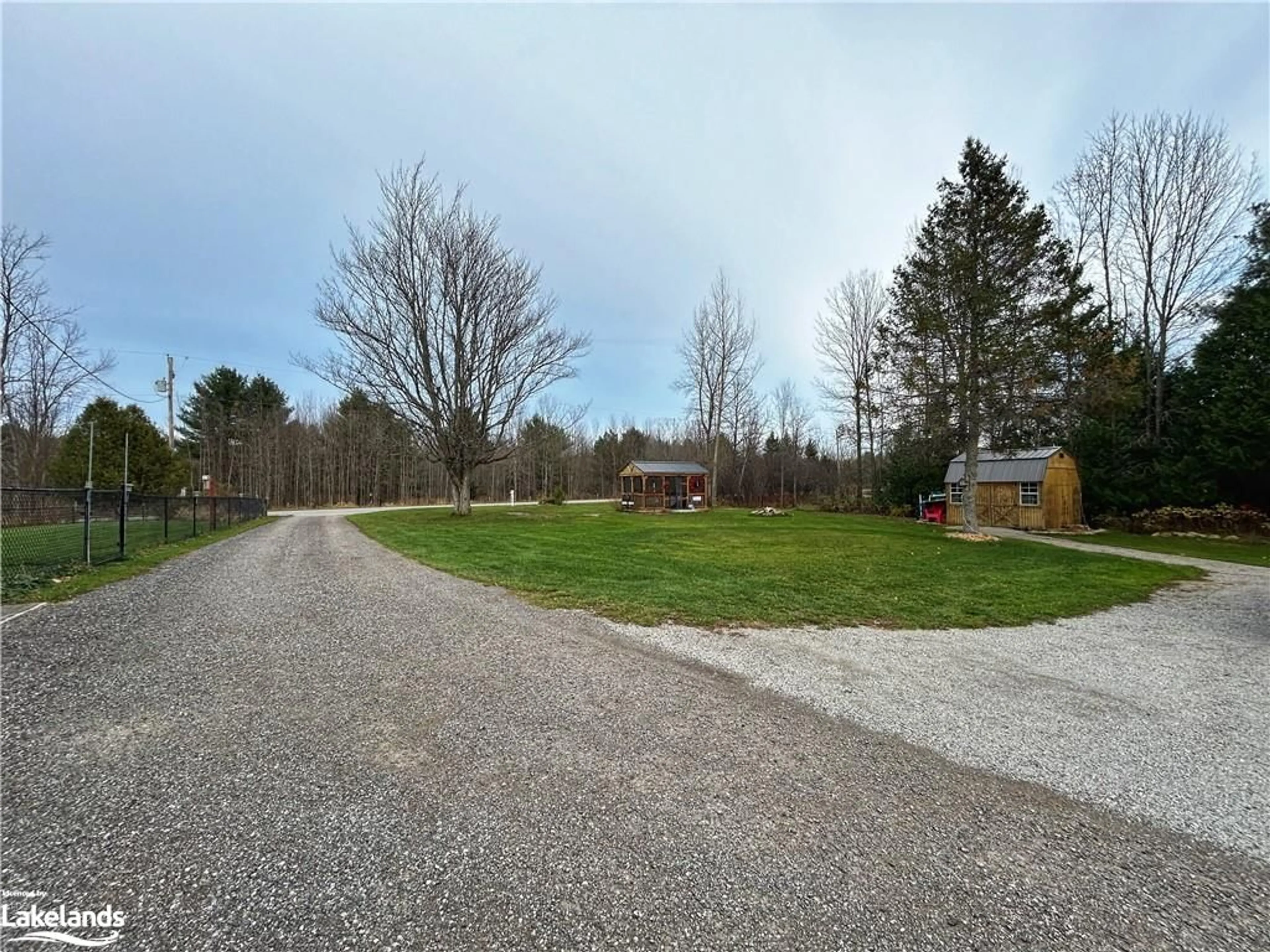 Frontside or backside of a home, the fenced backyard for 2066 Irish Line, Coldwater Ontario L0K 1E0