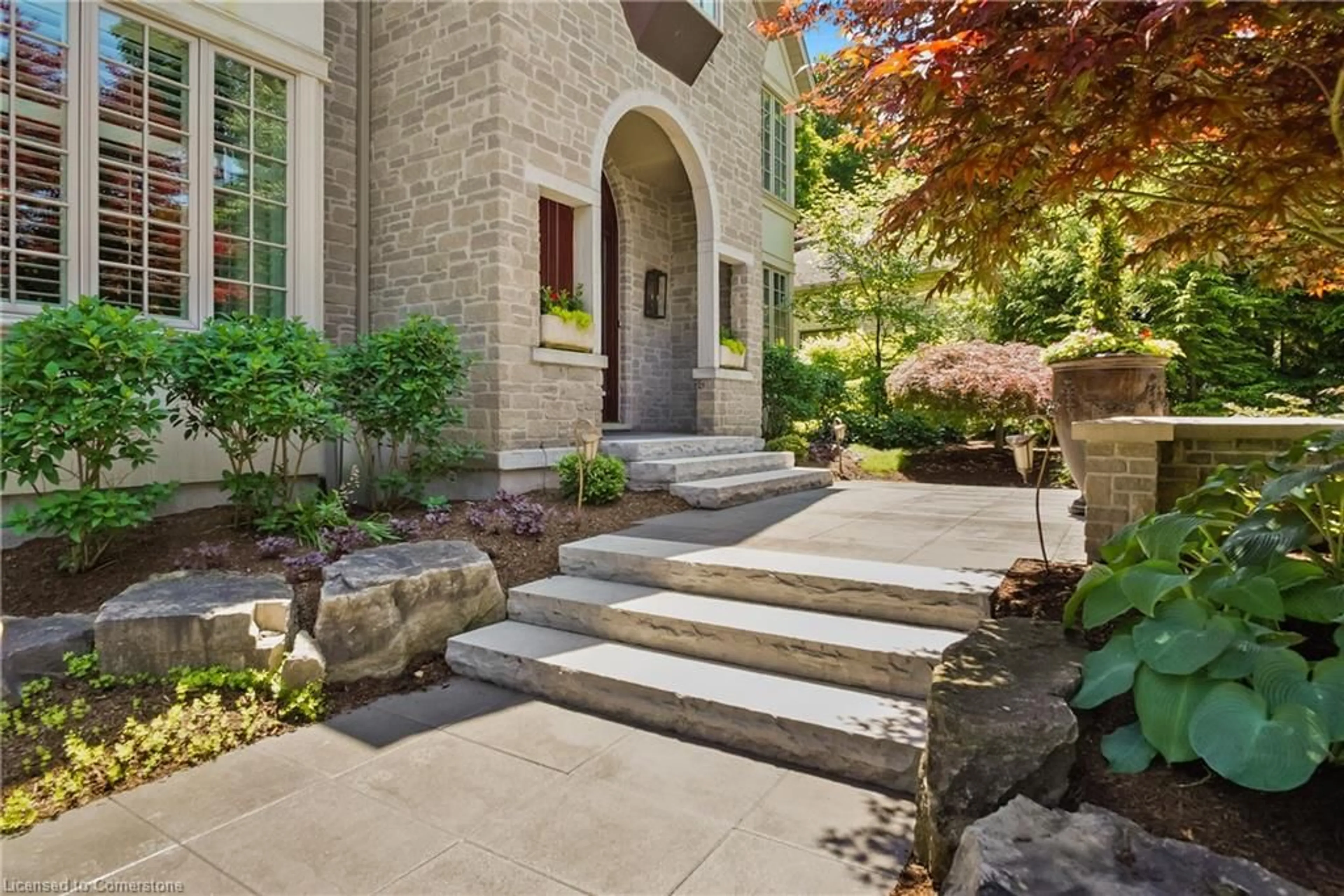 Home with brick exterior material for 310 Bushwood Crt, Waterloo Ontario N2T 2E6