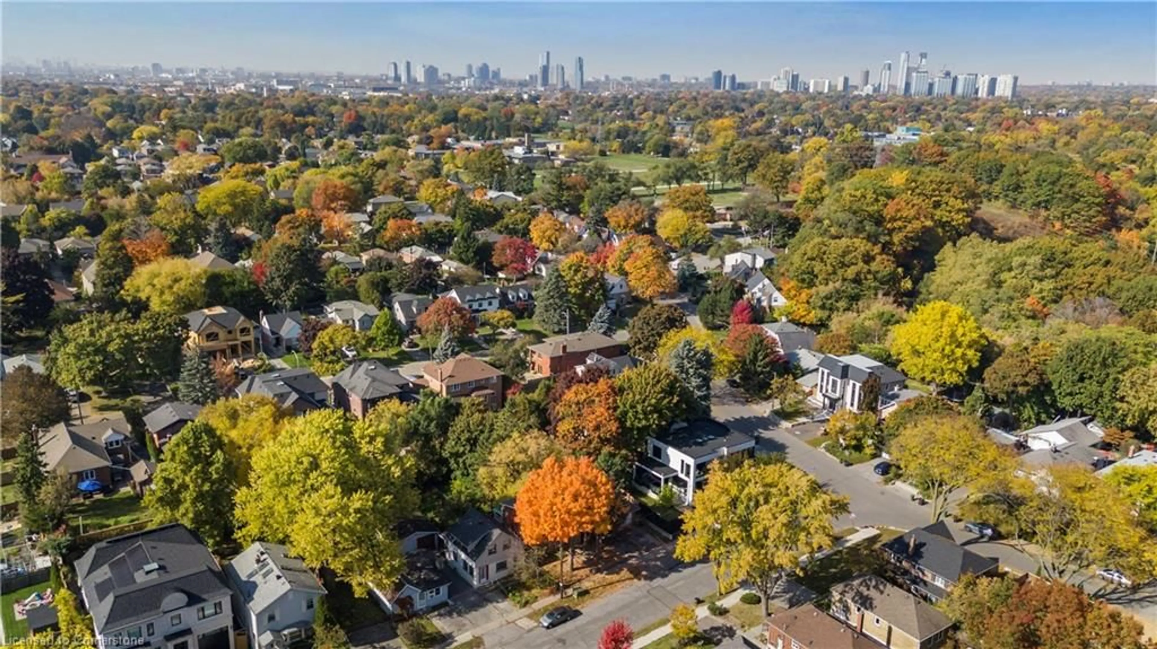 A pic from exterior of the house or condo, the view of city buildings for 30 Mcintosh Ave, Toronto Ontario M8Y 3E2