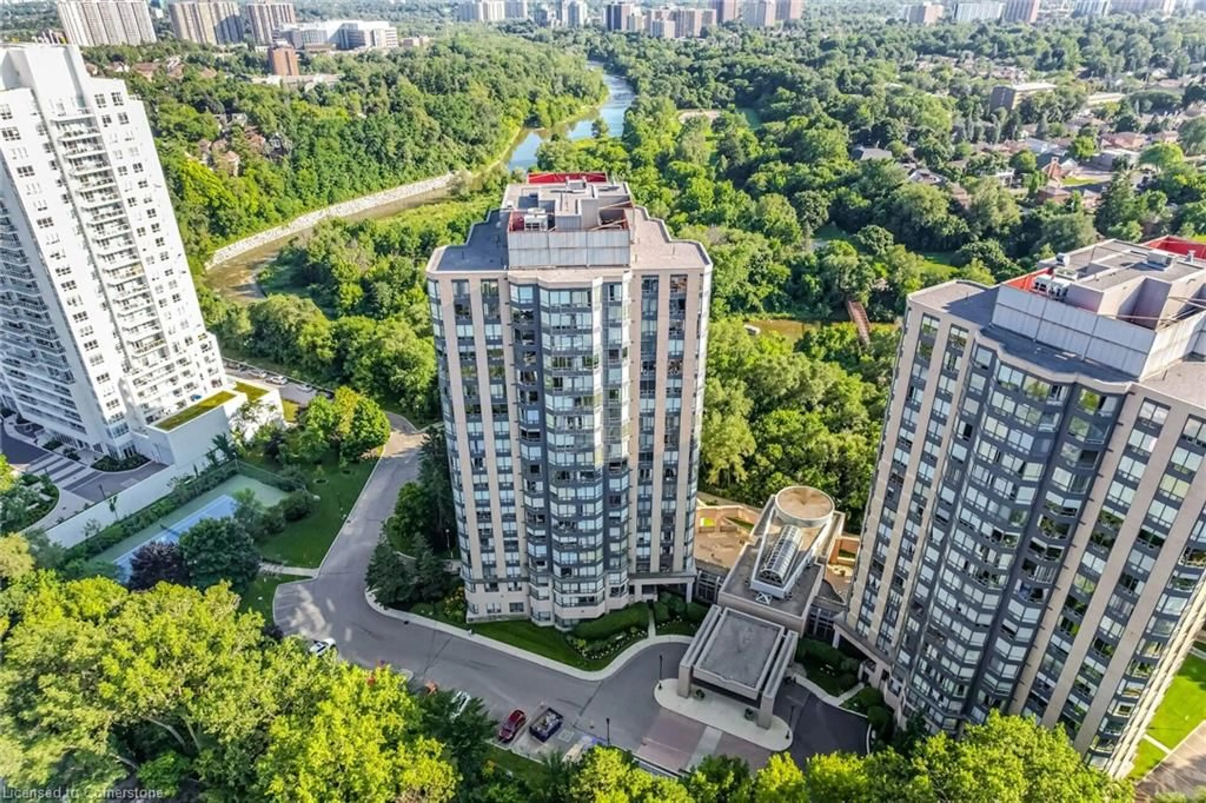 A pic from exterior of the house or condo, the view of city buildings for 1 Hickory Tree Rd #401, Toronto Ontario M9N 3W4