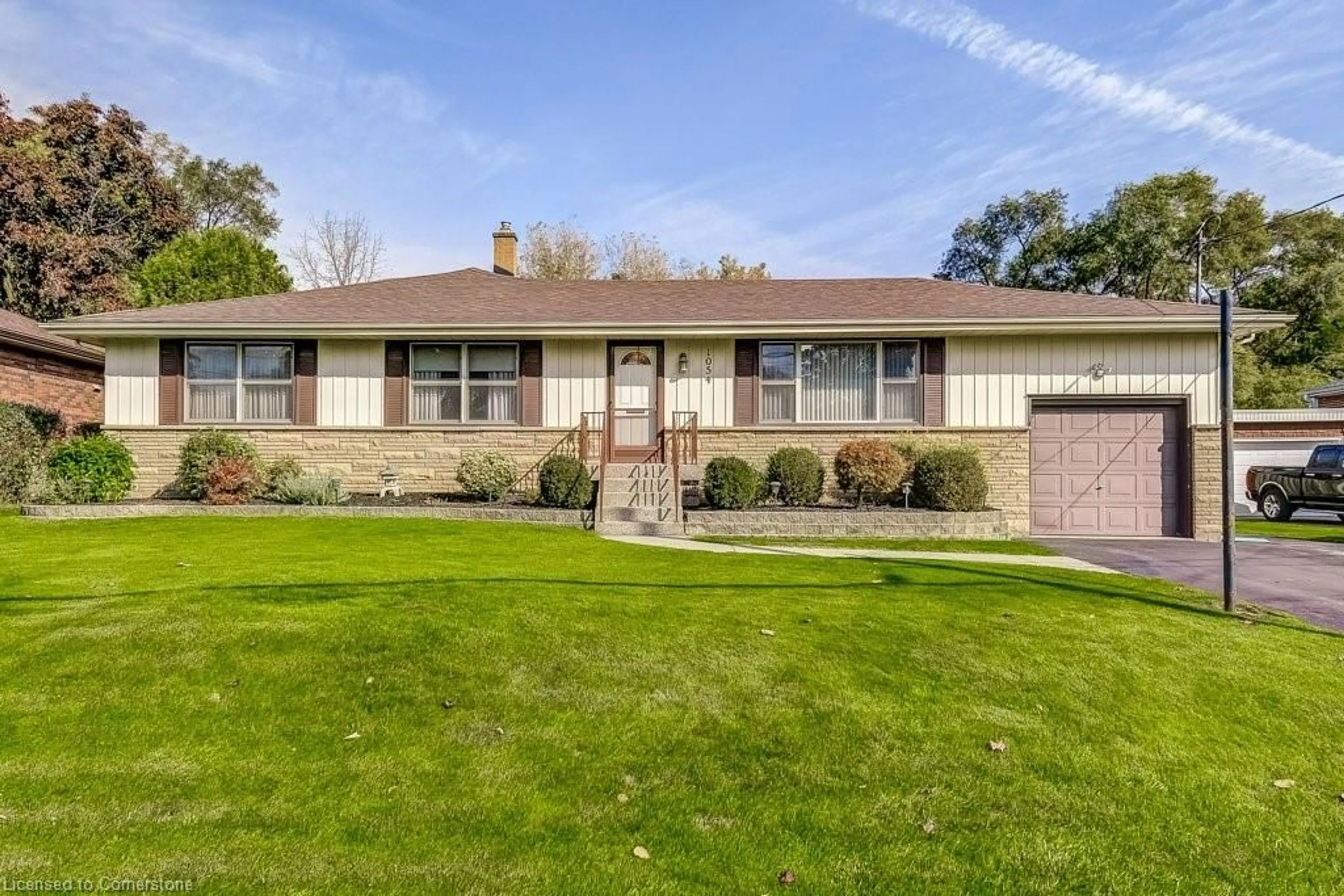 Frontside or backside of a home, the street view for 1054 Shepherd's Dr, Burlington Ontario L7T 3R3