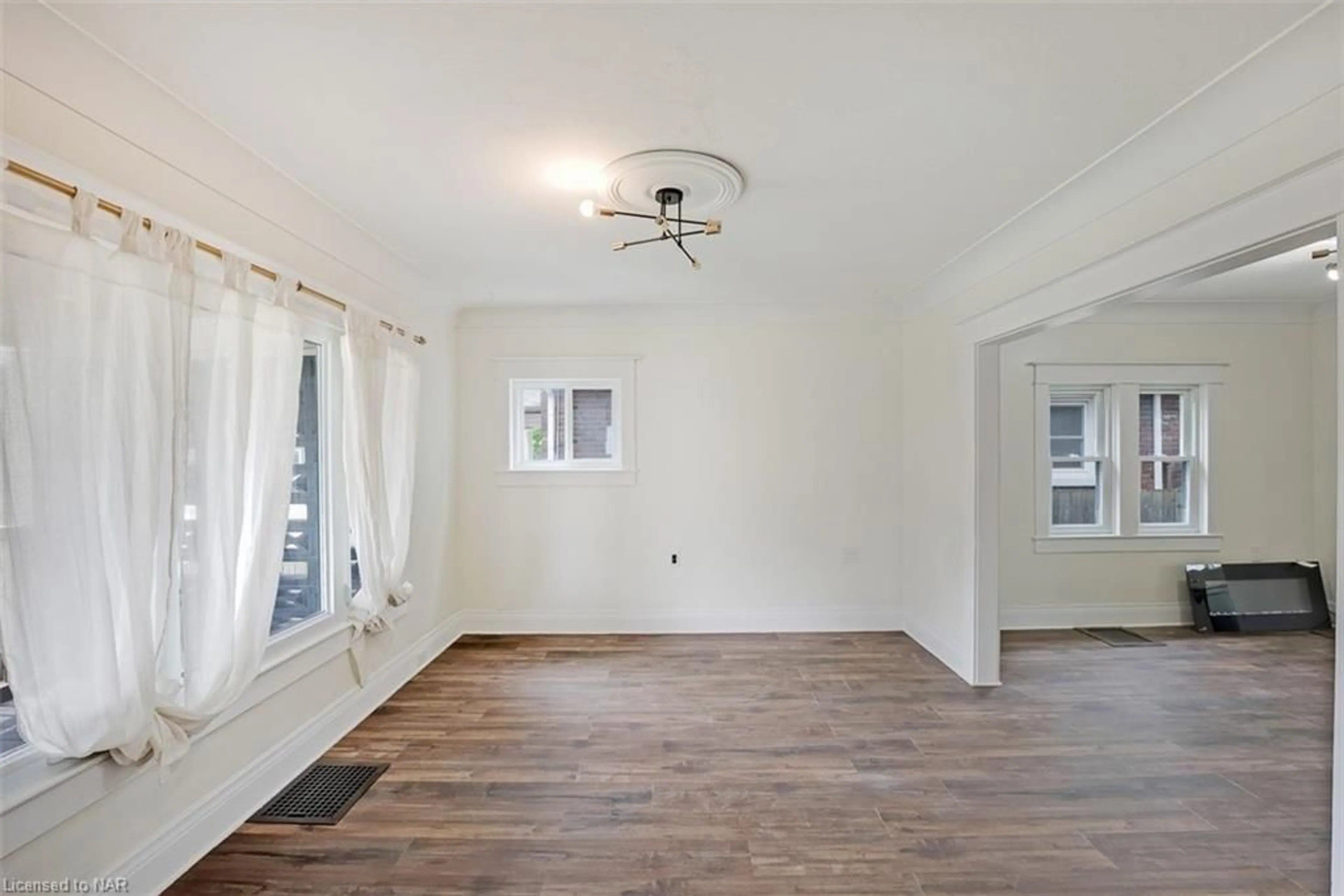 A pic of a room, wood floors for 20 Randolph St, Welland Ontario L3B 4C2