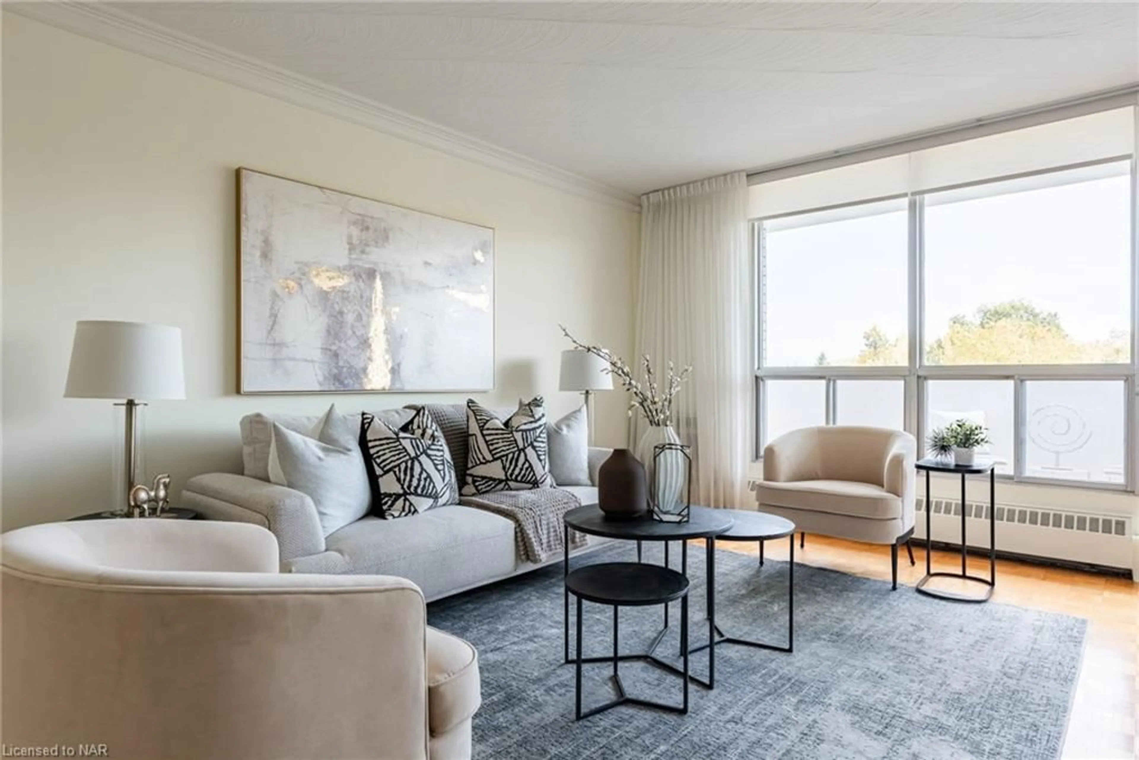 Living room, carpet floors for 15 Towering Heights Blvd #306, St. Catharines Ontario L2R 3G7