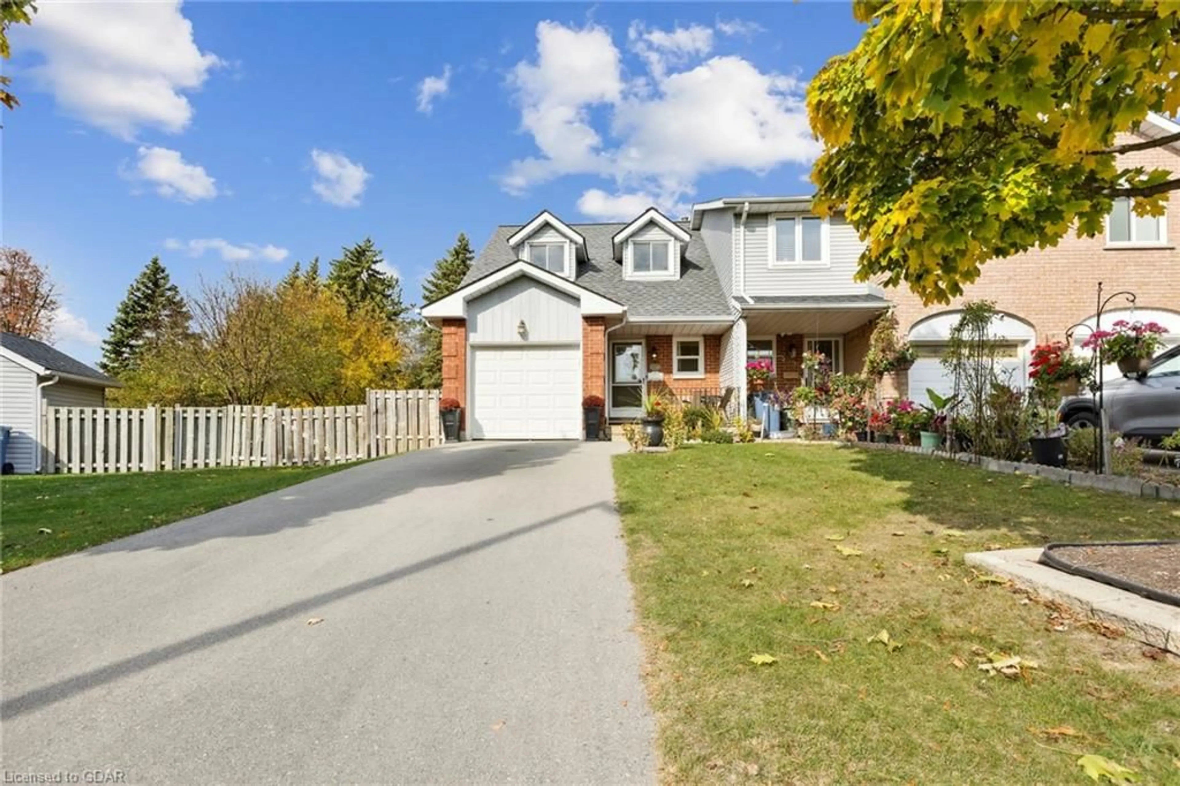 Frontside or backside of a home, the street view for 57 Grandridge Cres, Guelph Ontario N1H 8G2