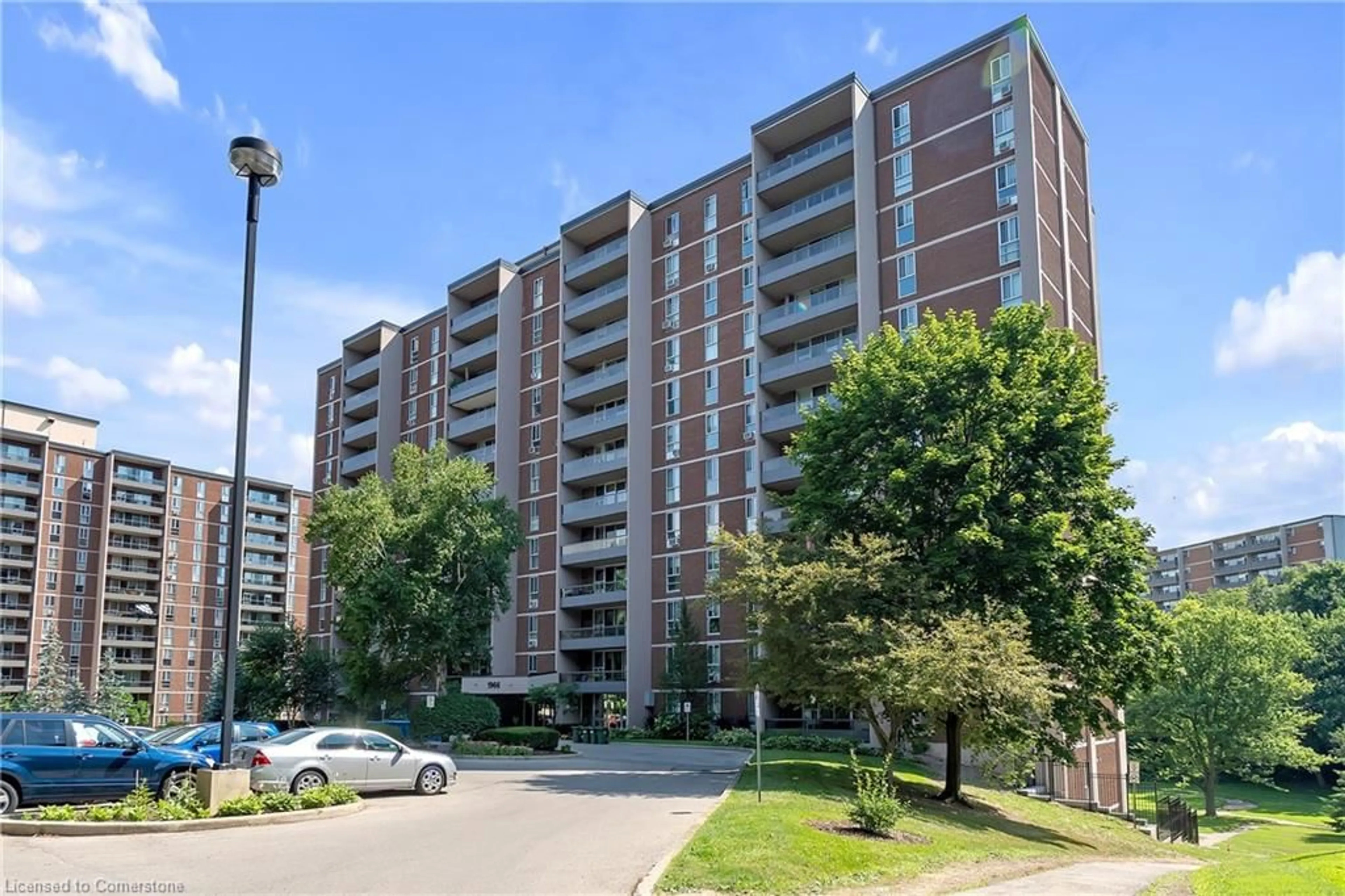 A pic from exterior of the house or condo, the street view for 1966 Main St #402, Hamilton Ontario L8S 1J6