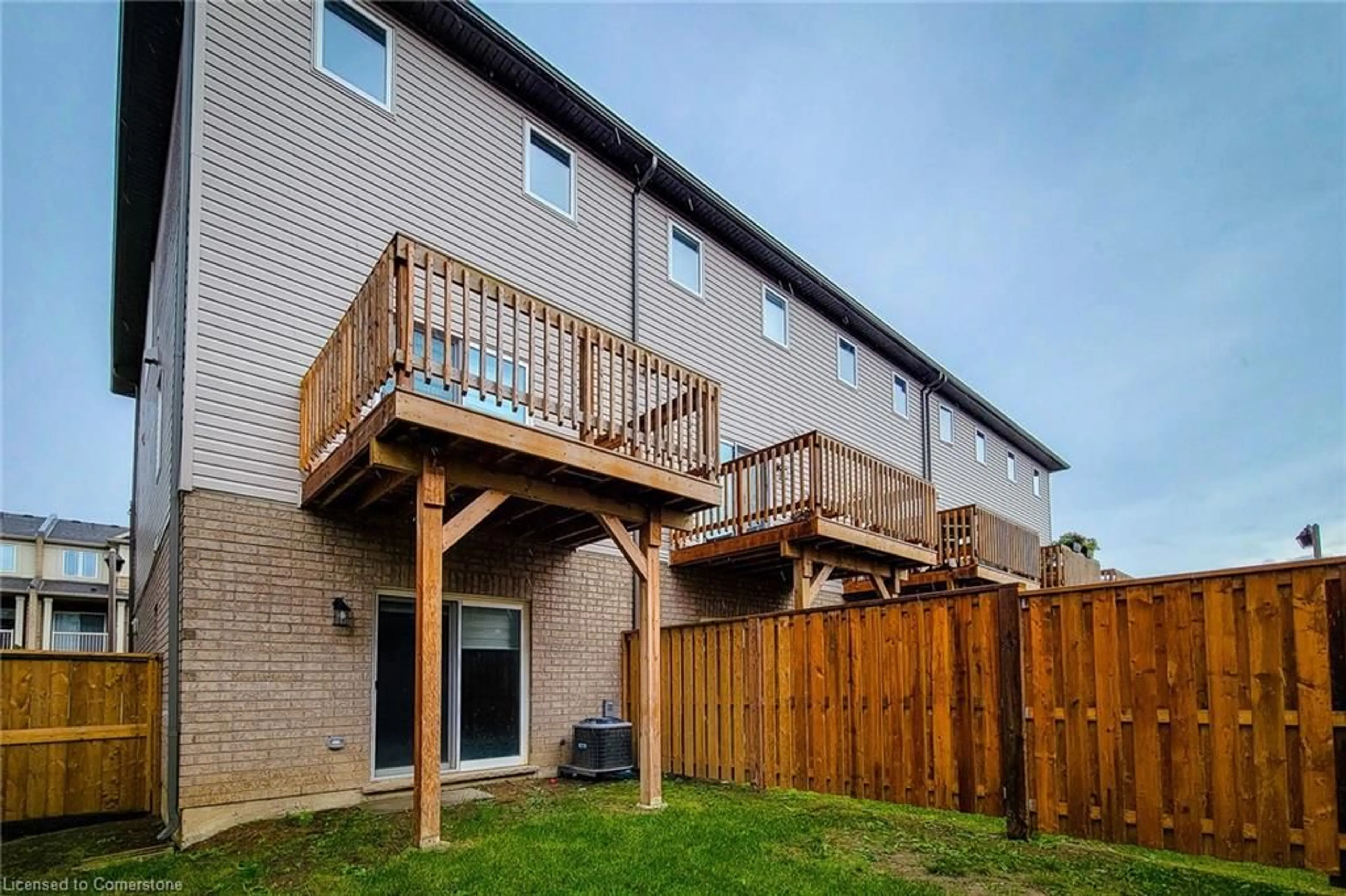 Patio, the fenced backyard for 24 Aqua Lane, Stoney Creek Ontario L0R 1P0