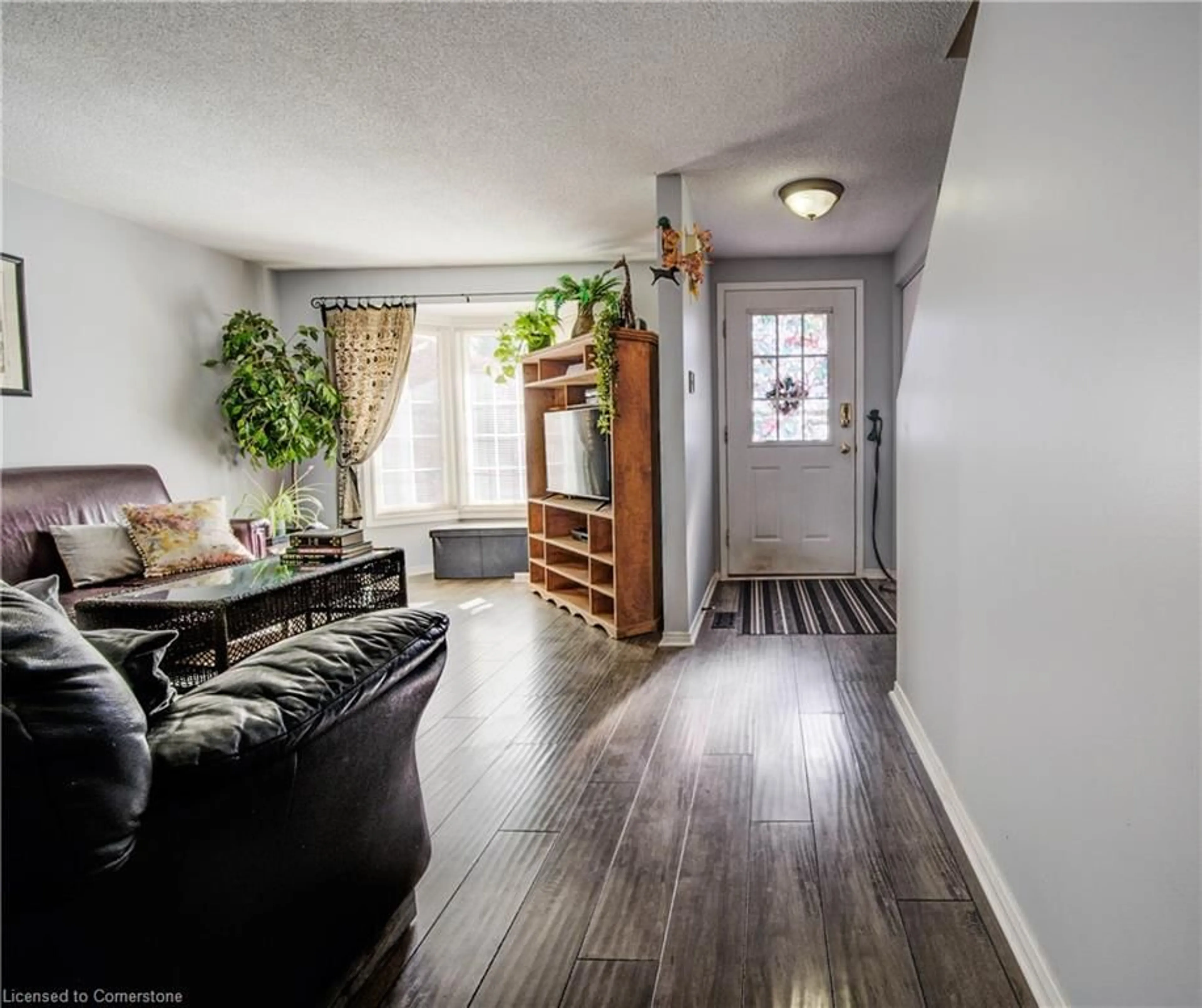 Indoor entryway, wood floors for 129 Victoria Rd #9, Guelph Ontario N1E 6V3