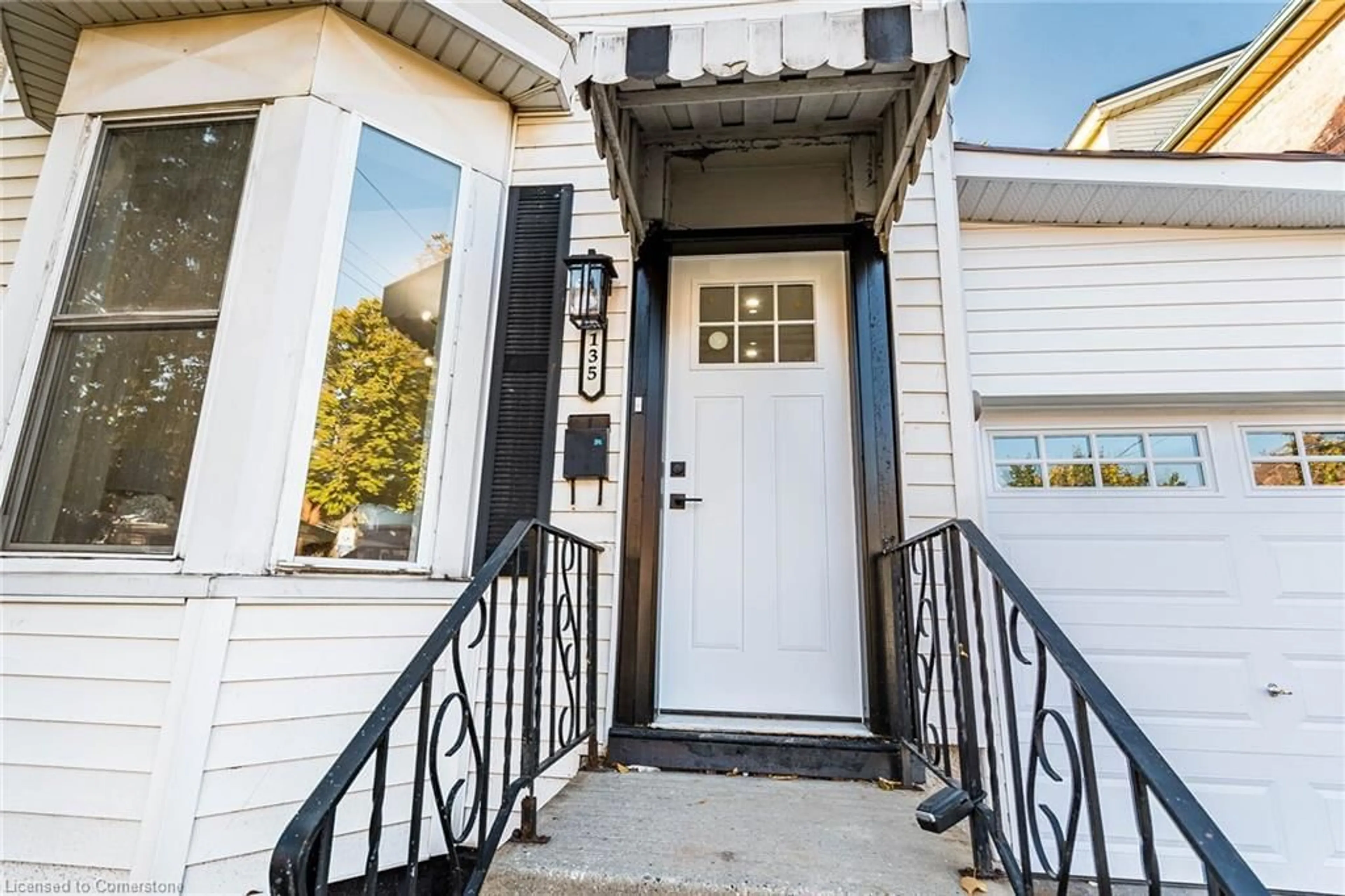 Indoor entryway, wood floors for 135 East Ave, Hamilton Ontario L8L 5H8