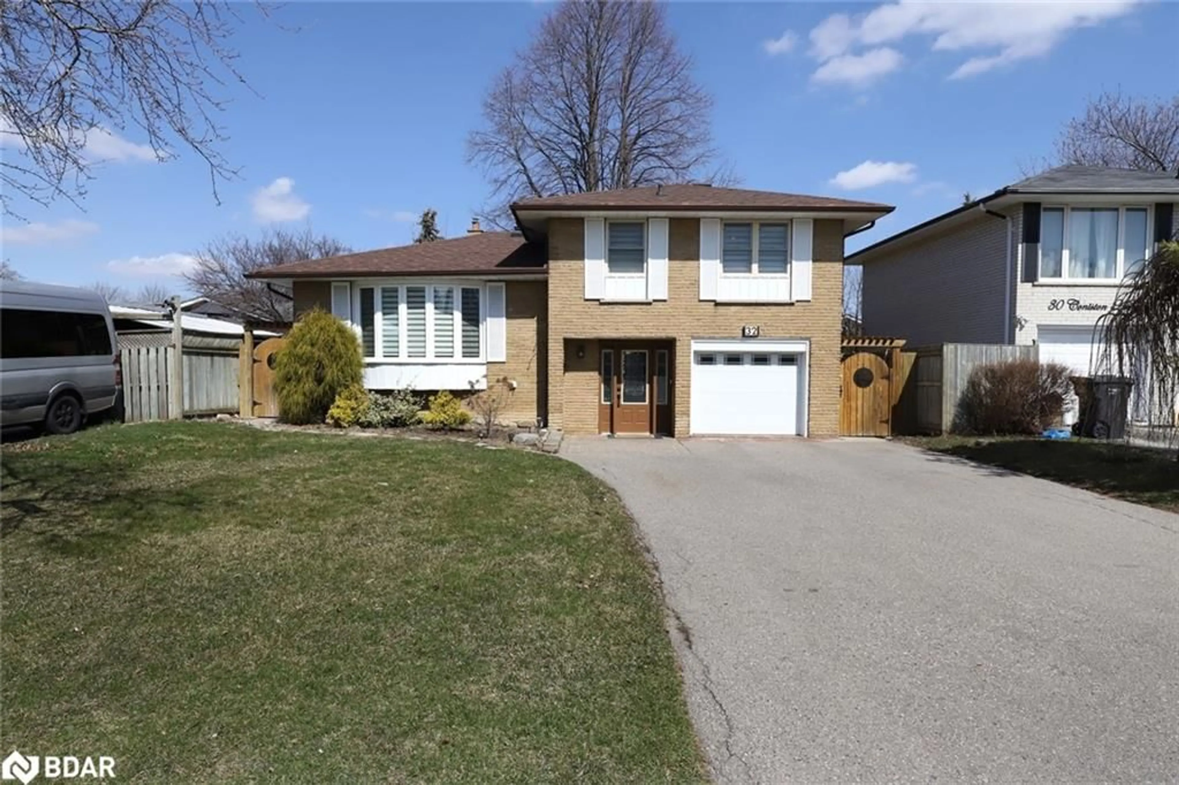 Frontside or backside of a home, the street view for 32 Coniston Ave, Brampton Ontario L6X 2H4