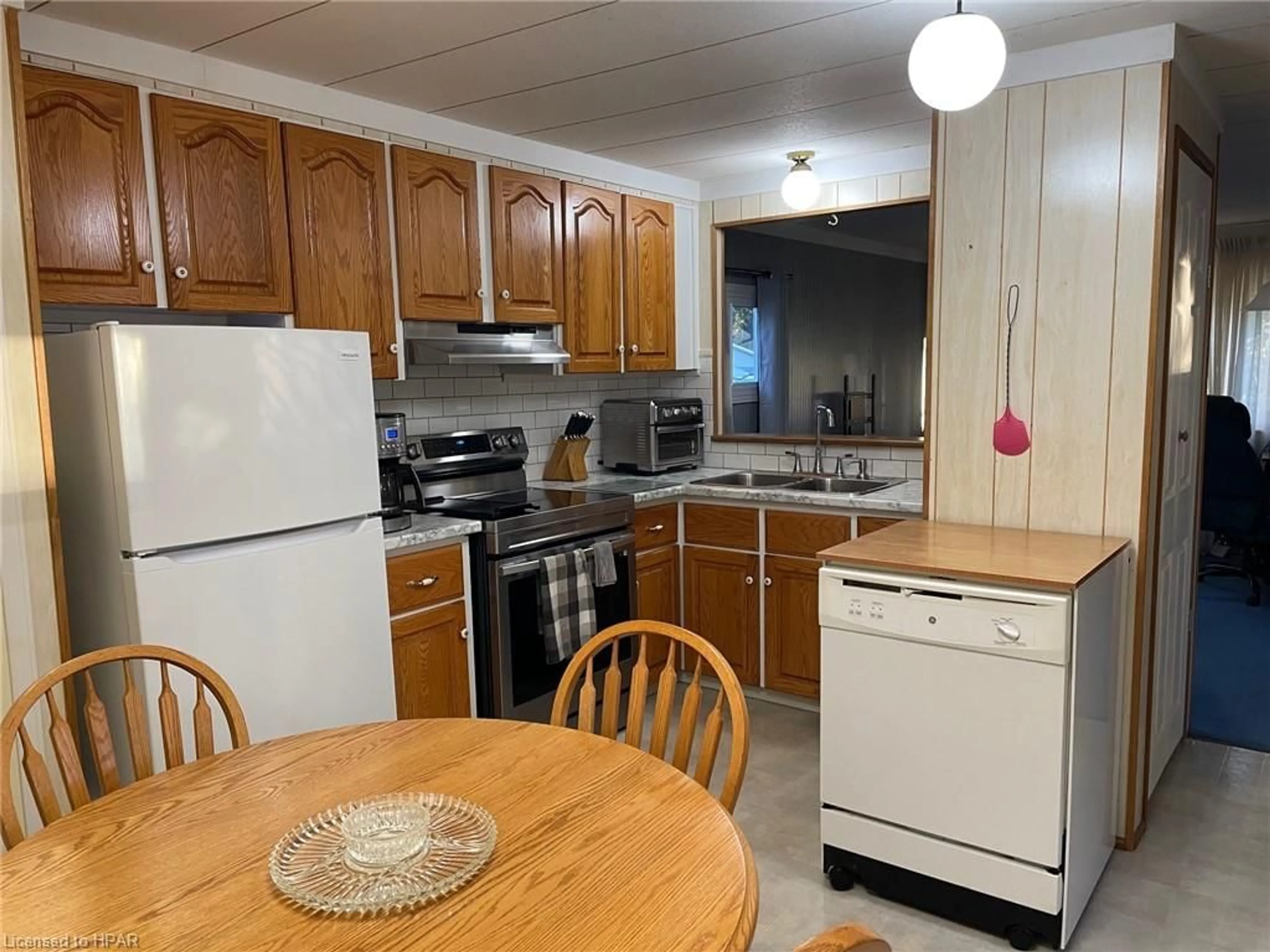 Standard kitchen, wood floors, cottage for 36 Sutton Dr, Huron Haven Ontario N7A 3Y3