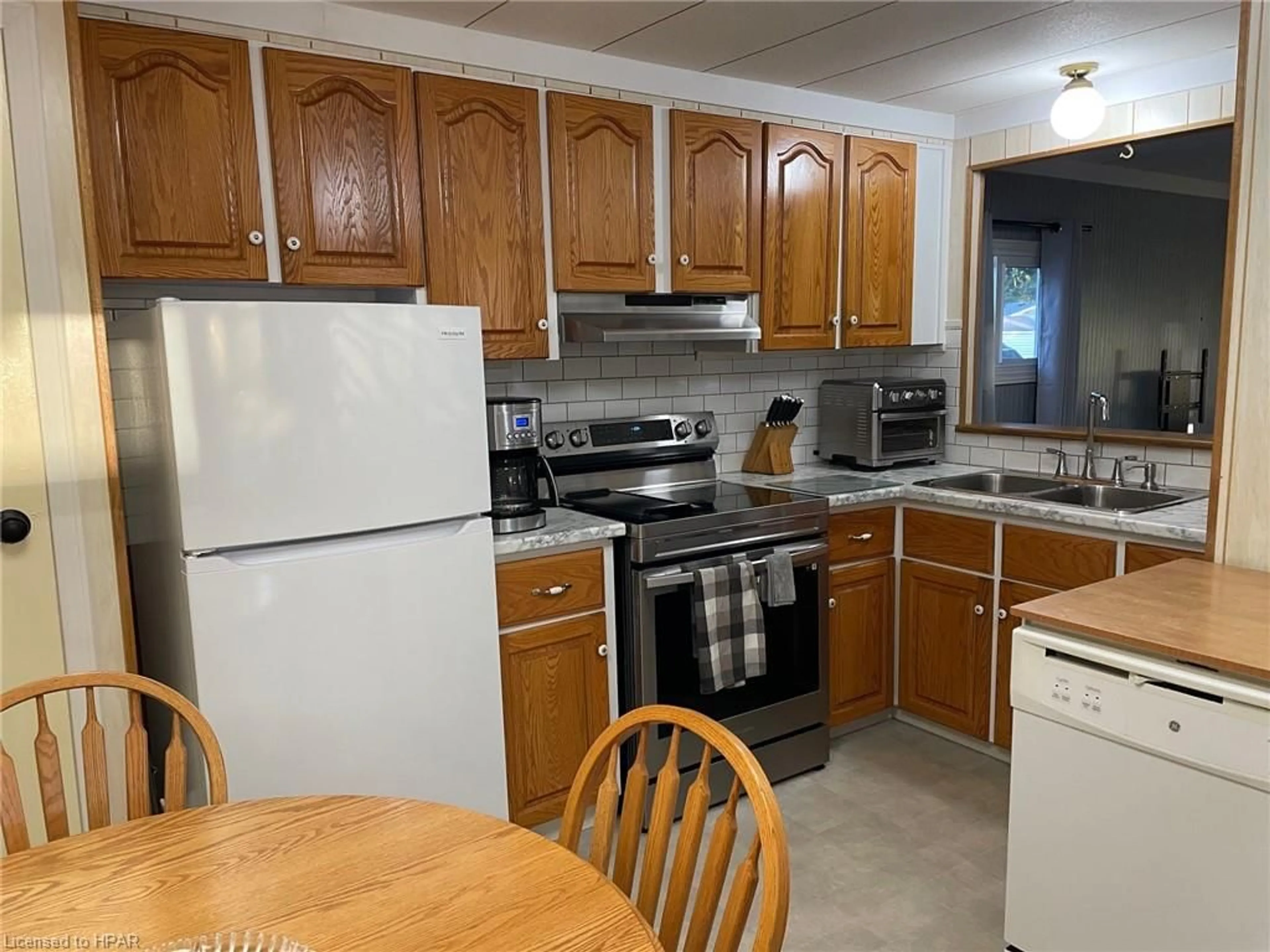 Standard kitchen, wood floors, cottage for 36 Sutton Dr, Huron Haven Ontario N7A 3Y3