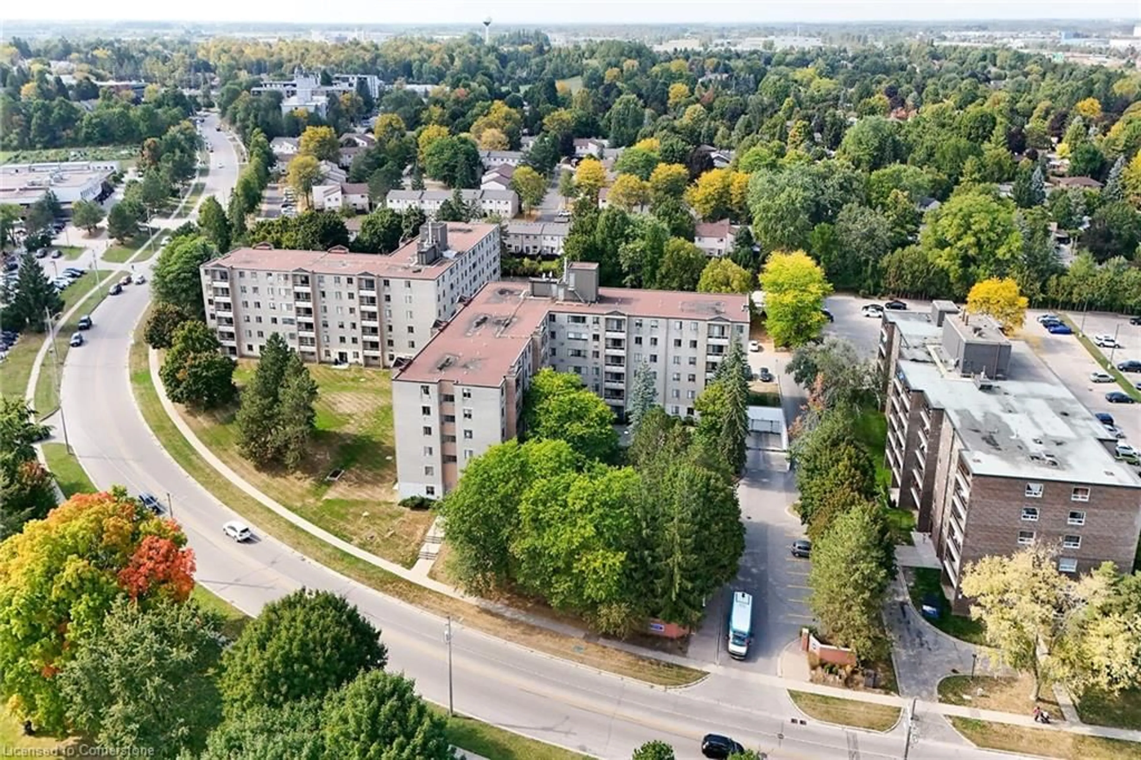 A pic from exterior of the house or condo, the view of city buildings for 89 Westwood Rd #308, Guelph Ontario N1H 7J6