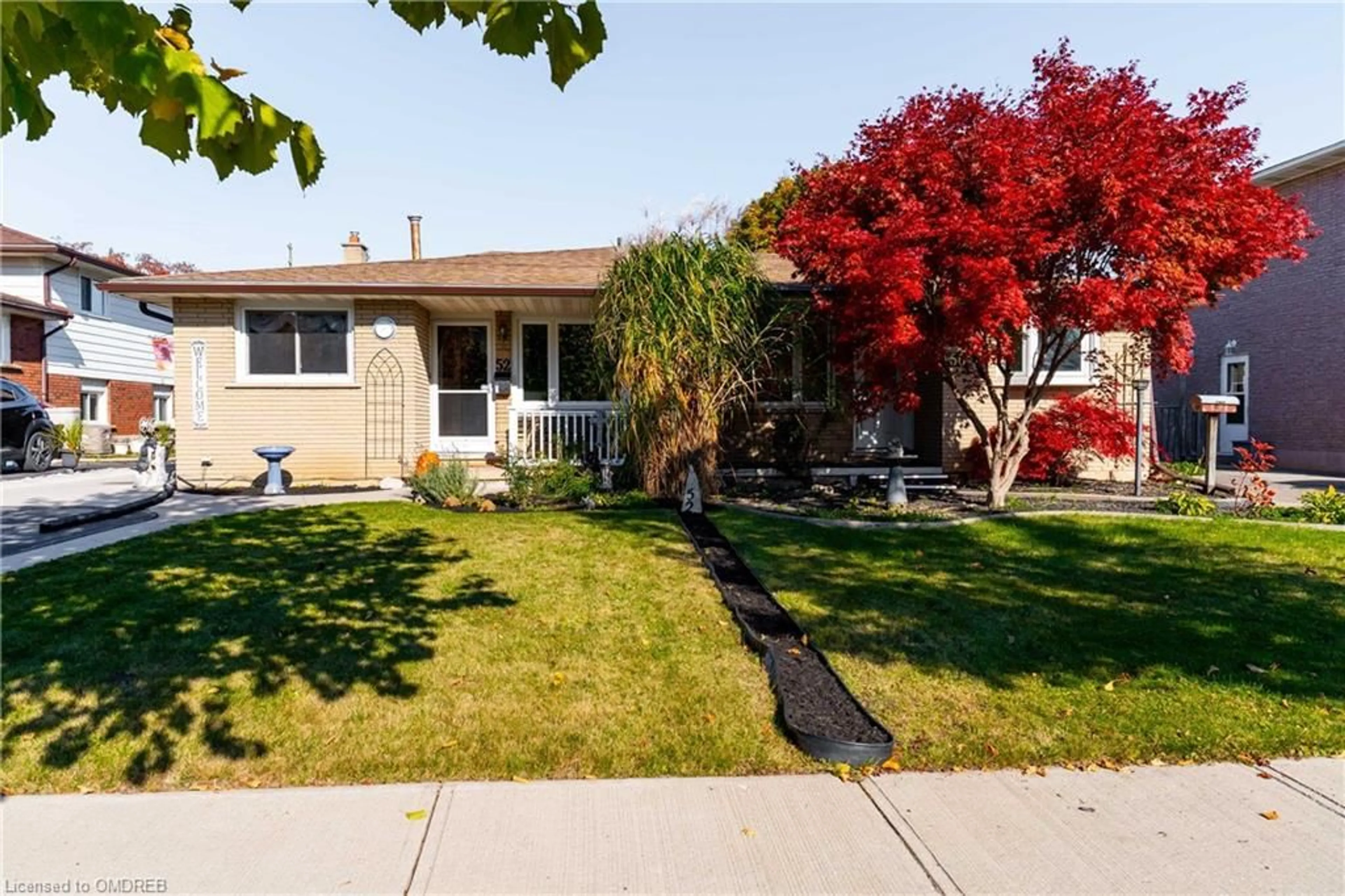 Frontside or backside of a home, the fenced backyard for 52 Westchester Way, Brantford Ontario N3R 6W6