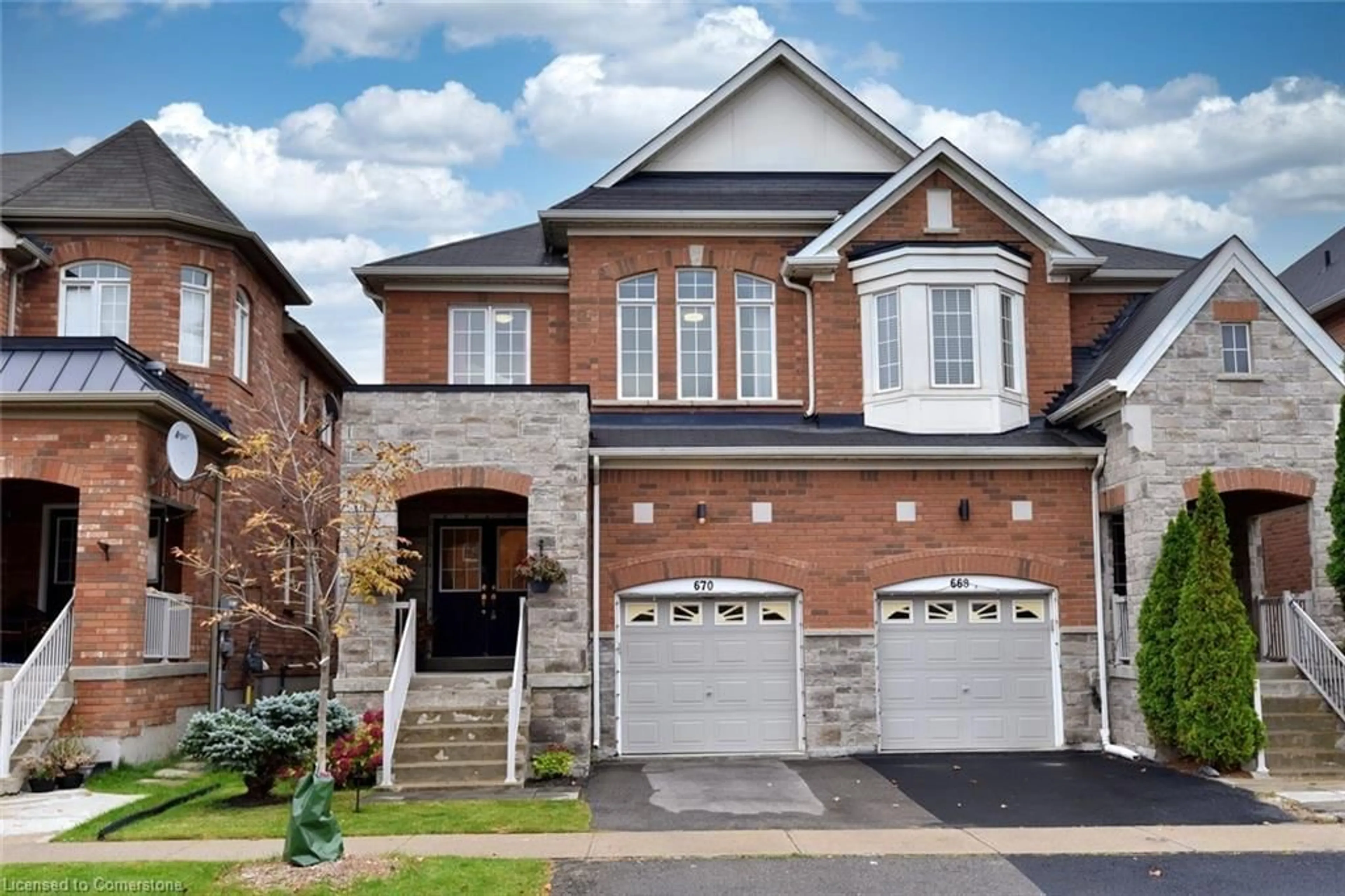 Home with brick exterior material for 670 Lott Cres, Milton Ontario L9T 7P6