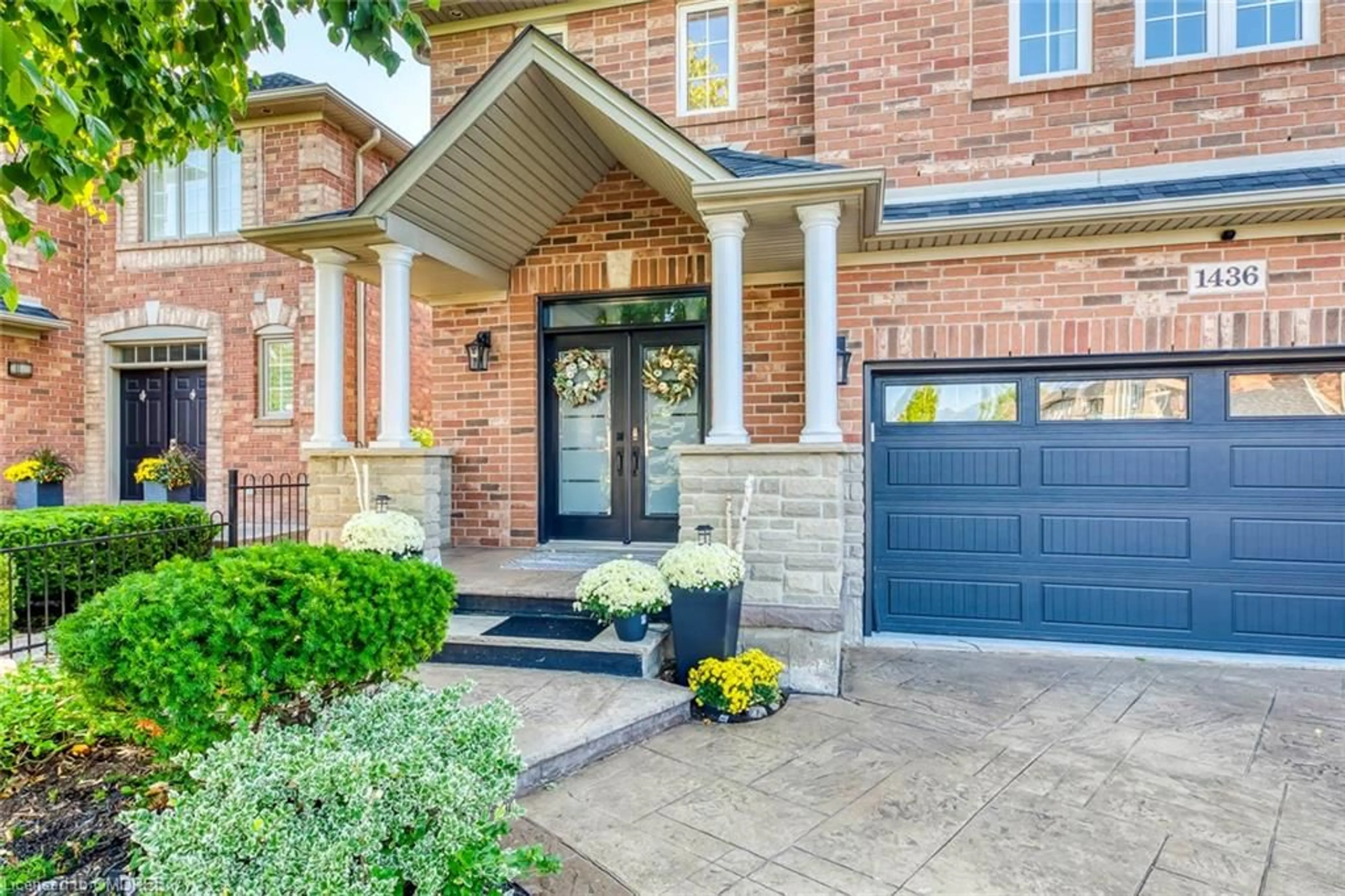 Home with brick exterior material for 1436 Gulledge Trail, Oakville Ontario L6M 3Z8