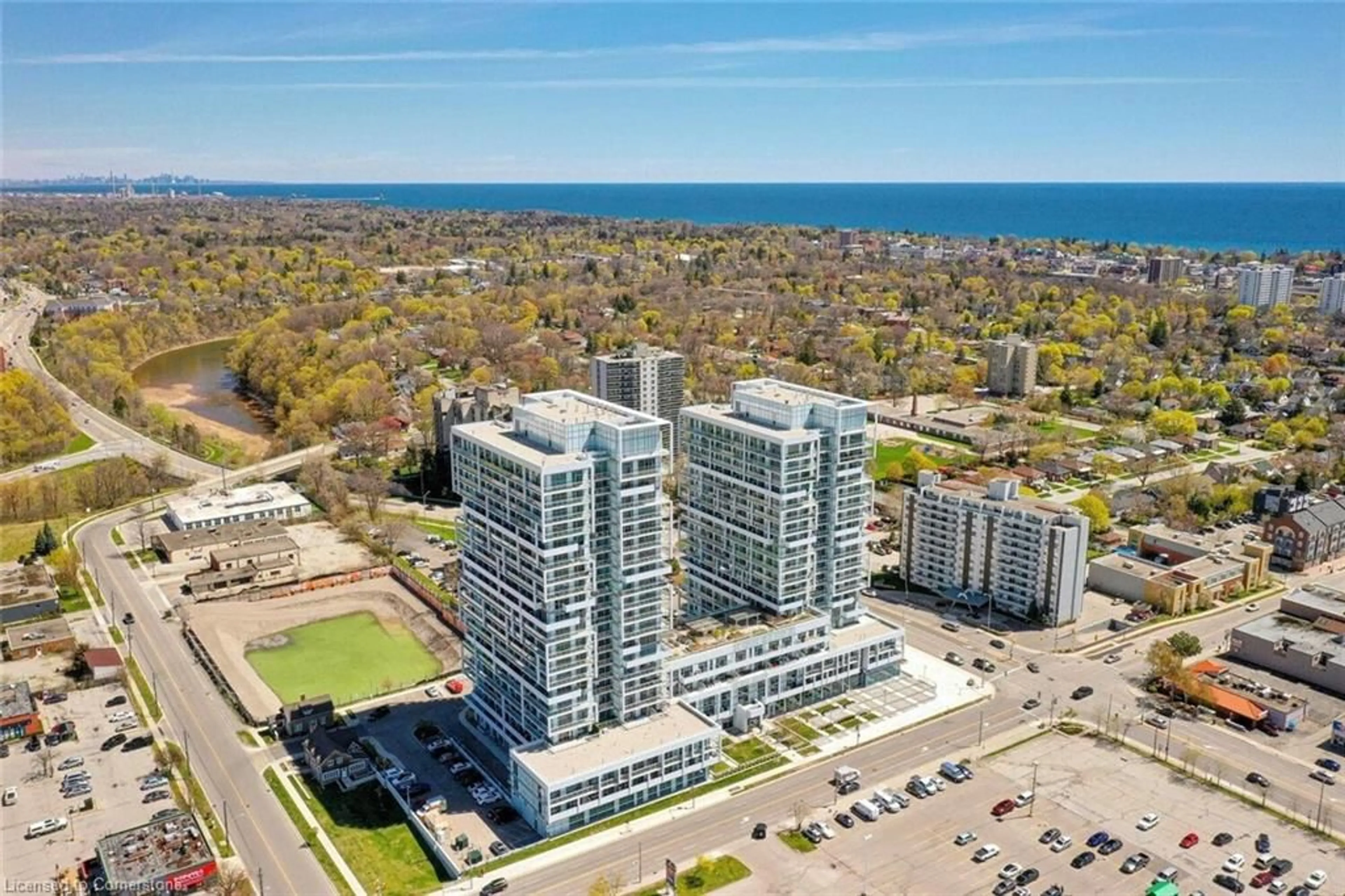 A pic from exterior of the house or condo, lake for 65 Speers Rd #1106, Oakville Ontario L6K 0J1