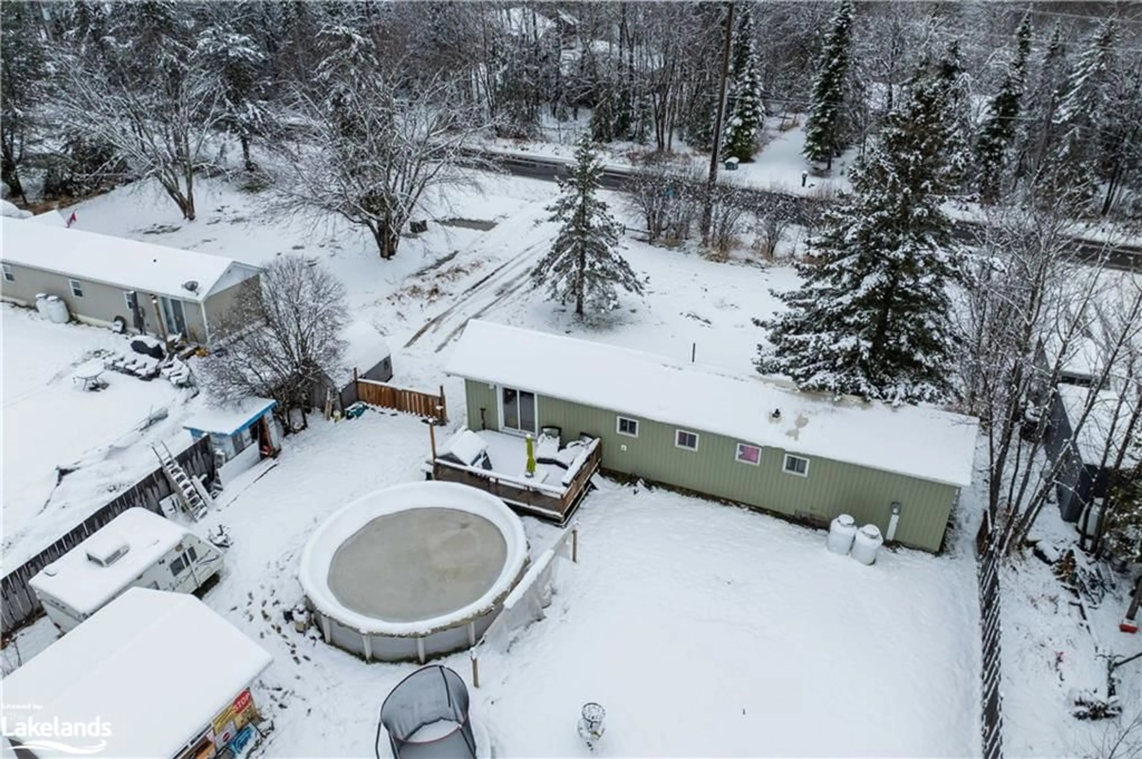 A pic from exterior of the house or condo, the fenced backyard for 1149 Old Muskoka Rd, Utterson Ontario P0B 1M0