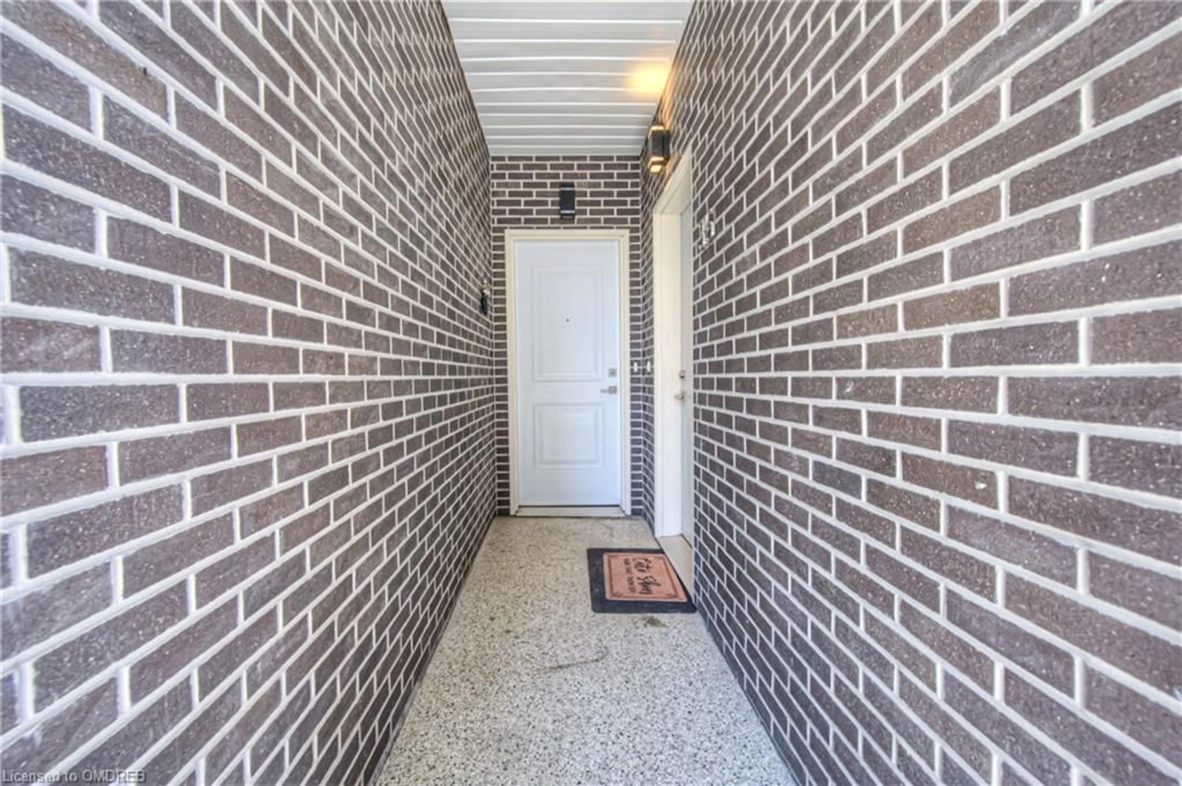 Indoor entryway, cement floor for 1430 Highland Rd #36 A, Kitchener Ontario N2N 0C3