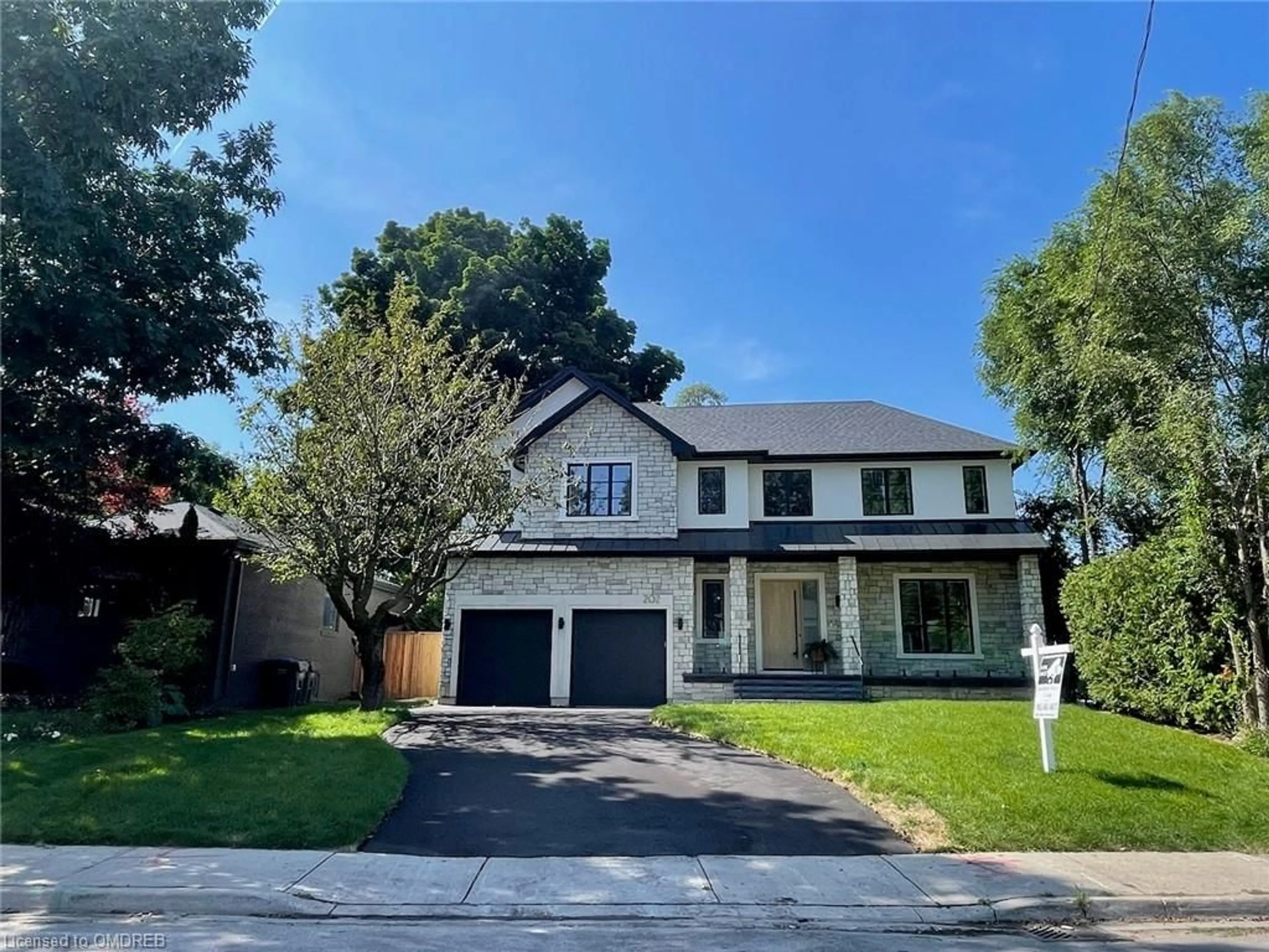 Frontside or backside of a home, the street view for 202 Queen St, Port Credit Ontario L5H 1L6