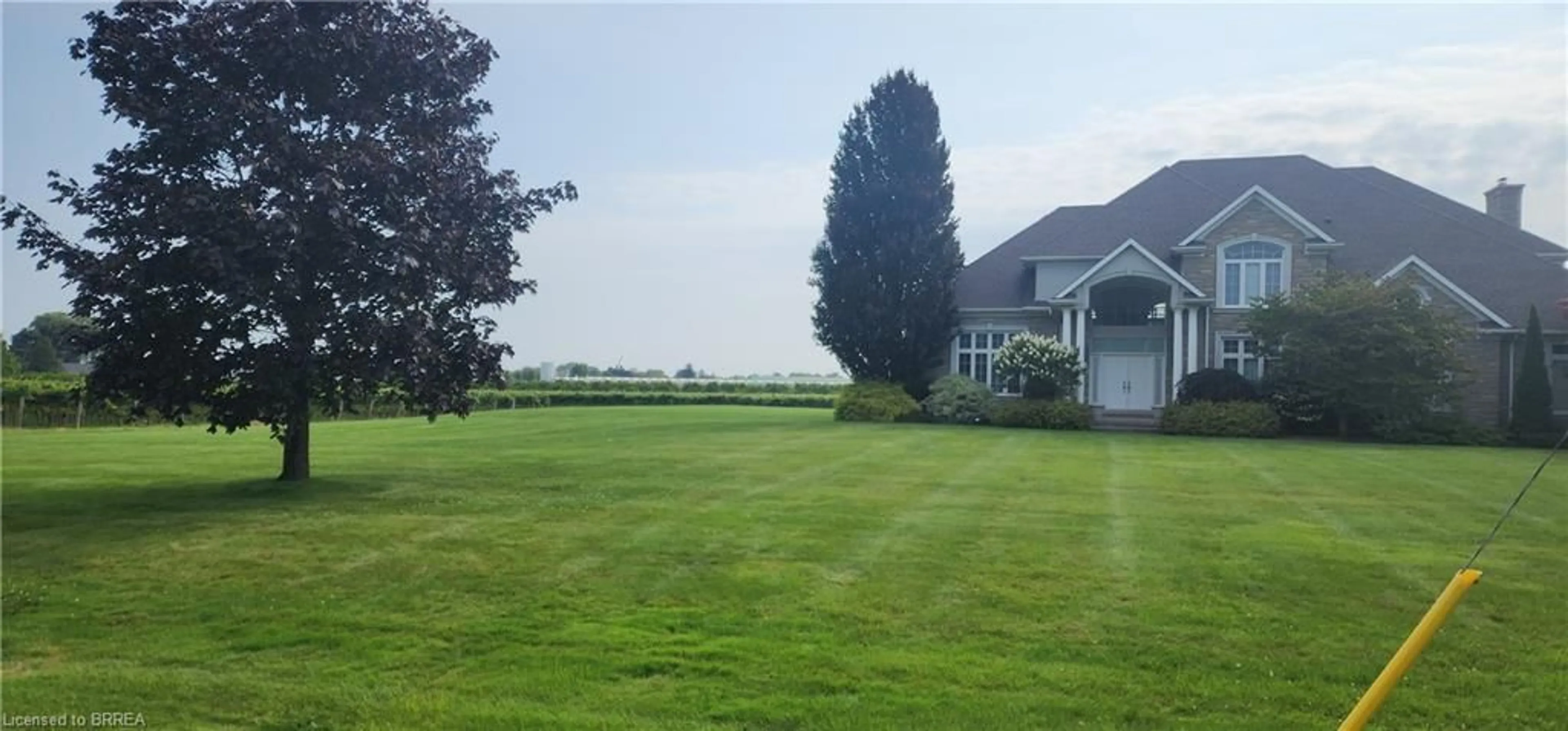 Frontside or backside of a home, the fenced backyard for 1895 Concession 4 Road Conc, Virgil Ontario L0S 1J0