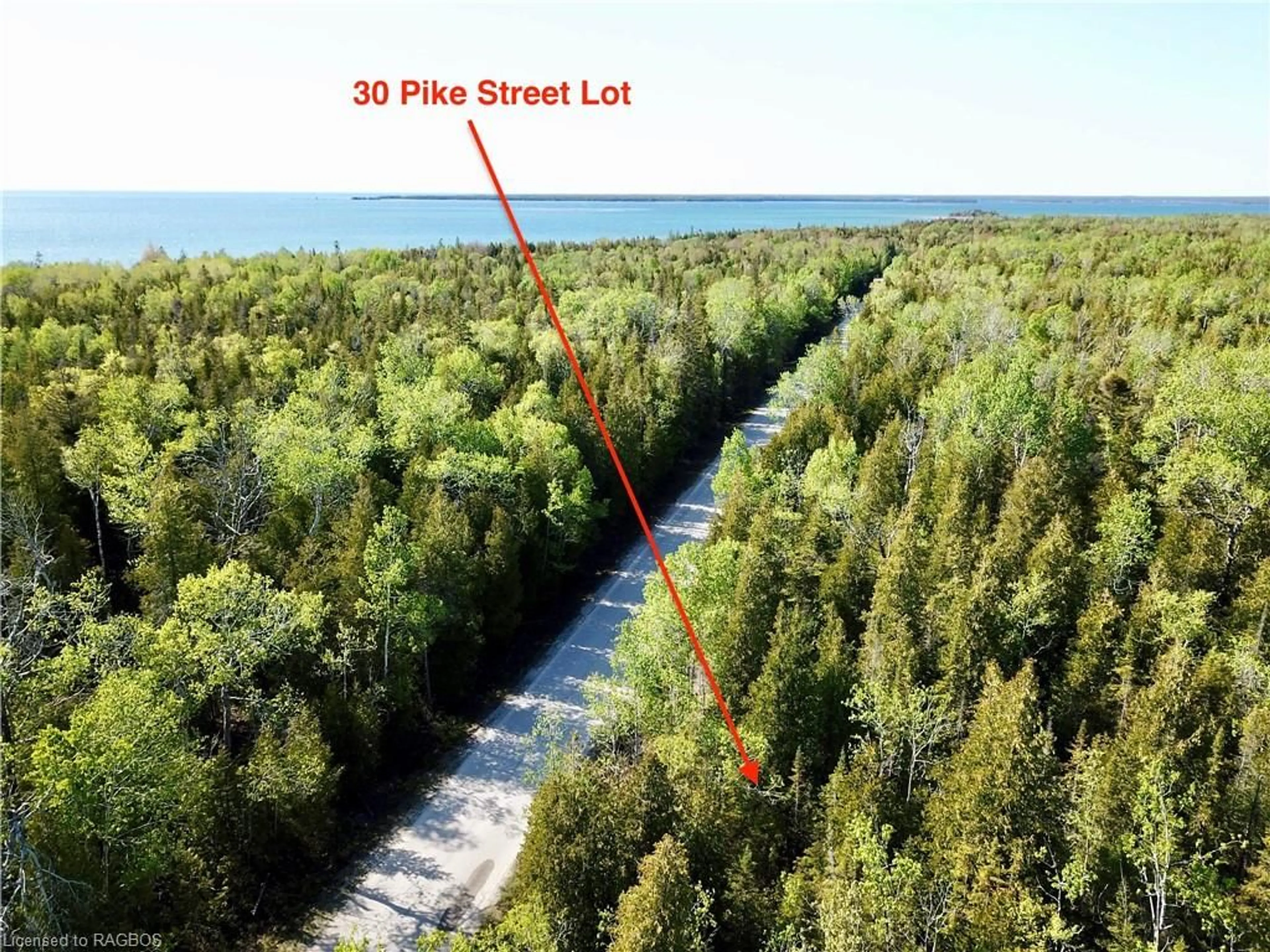 A pic from exterior of the house or condo, the street view for 30 Pike St, Northern Bruce Peninsula Ontario N0H 1W0