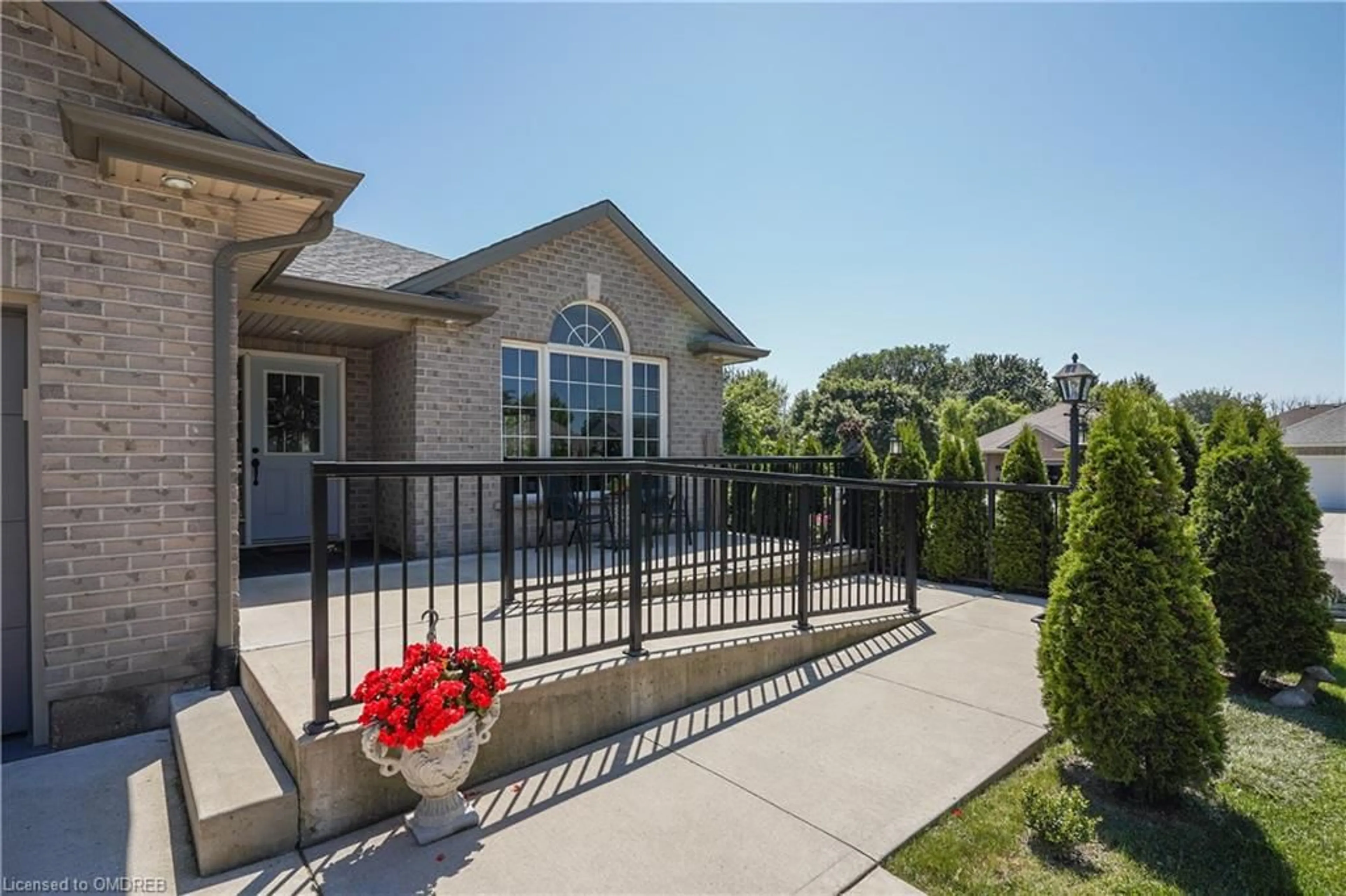 Frontside or backside of a home, the fenced backyard for 339 Wellbrook Ave, Welland Ontario L3C 7N3