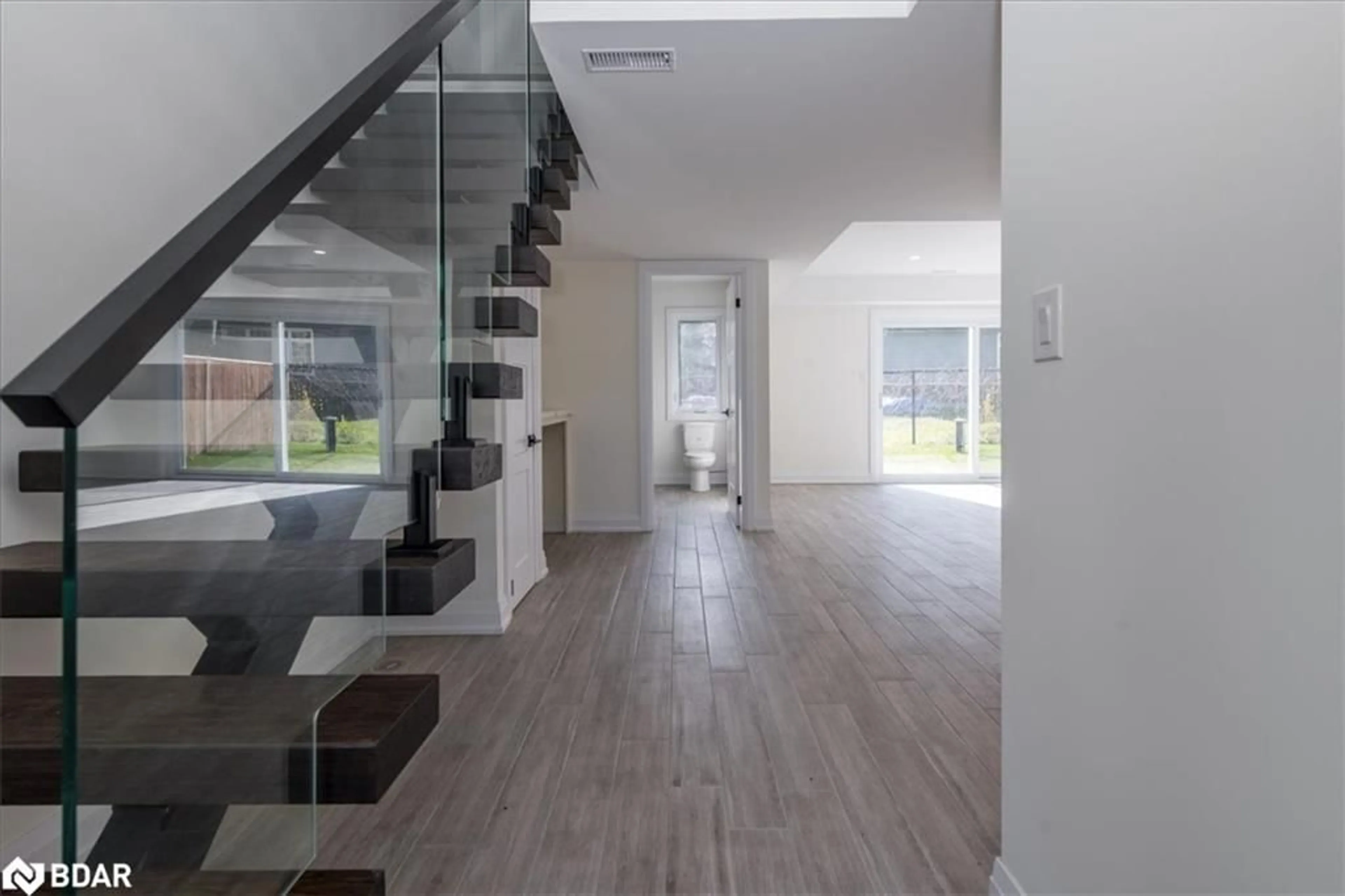 Indoor foyer, wood floors for 1103 Stoney Point Rd, Lefroy Ontario L0L 1W0