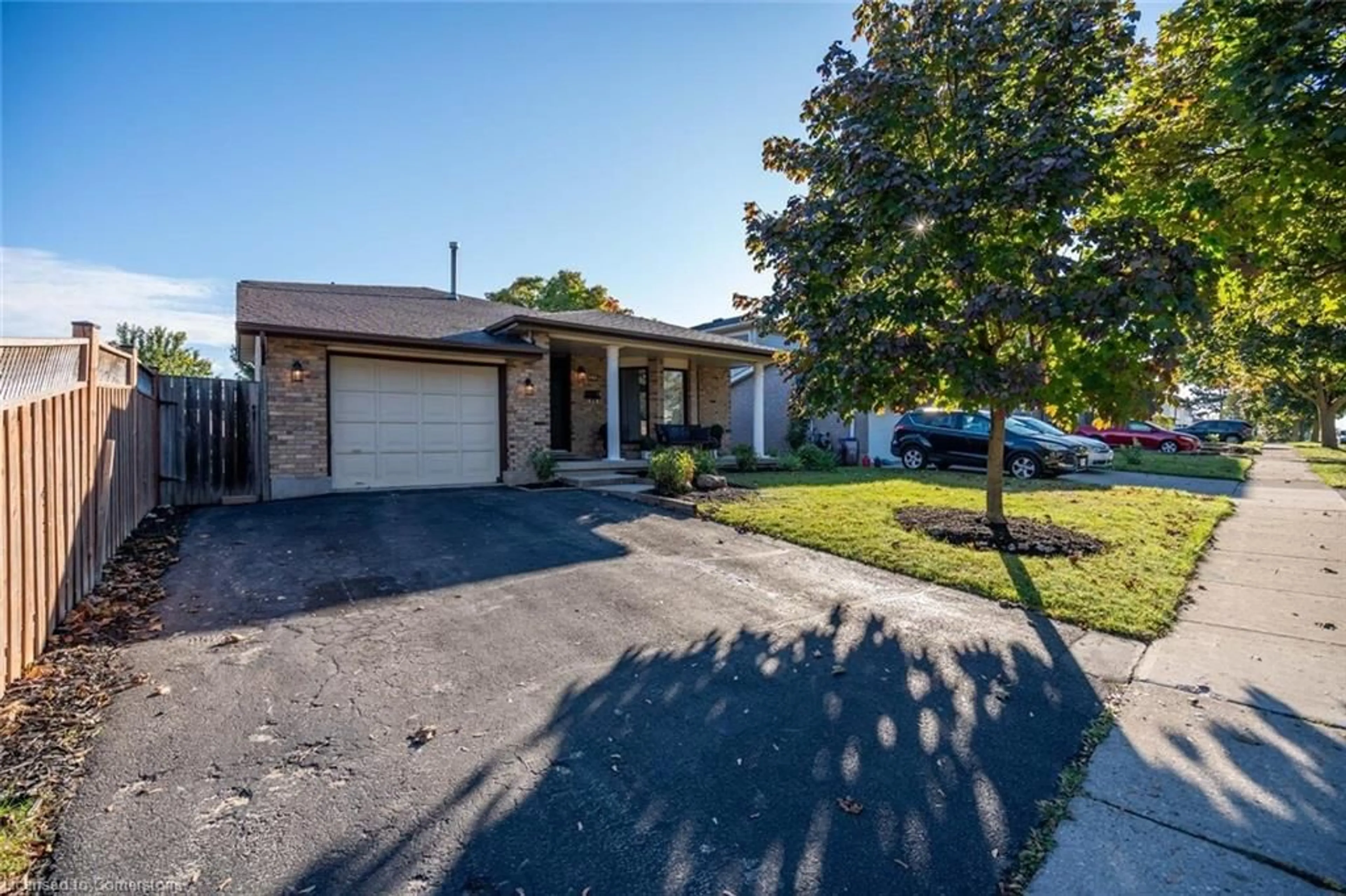 Frontside or backside of a home, the street view for 140 Dinison Cres, Kitchener Ontario N2E 2V2