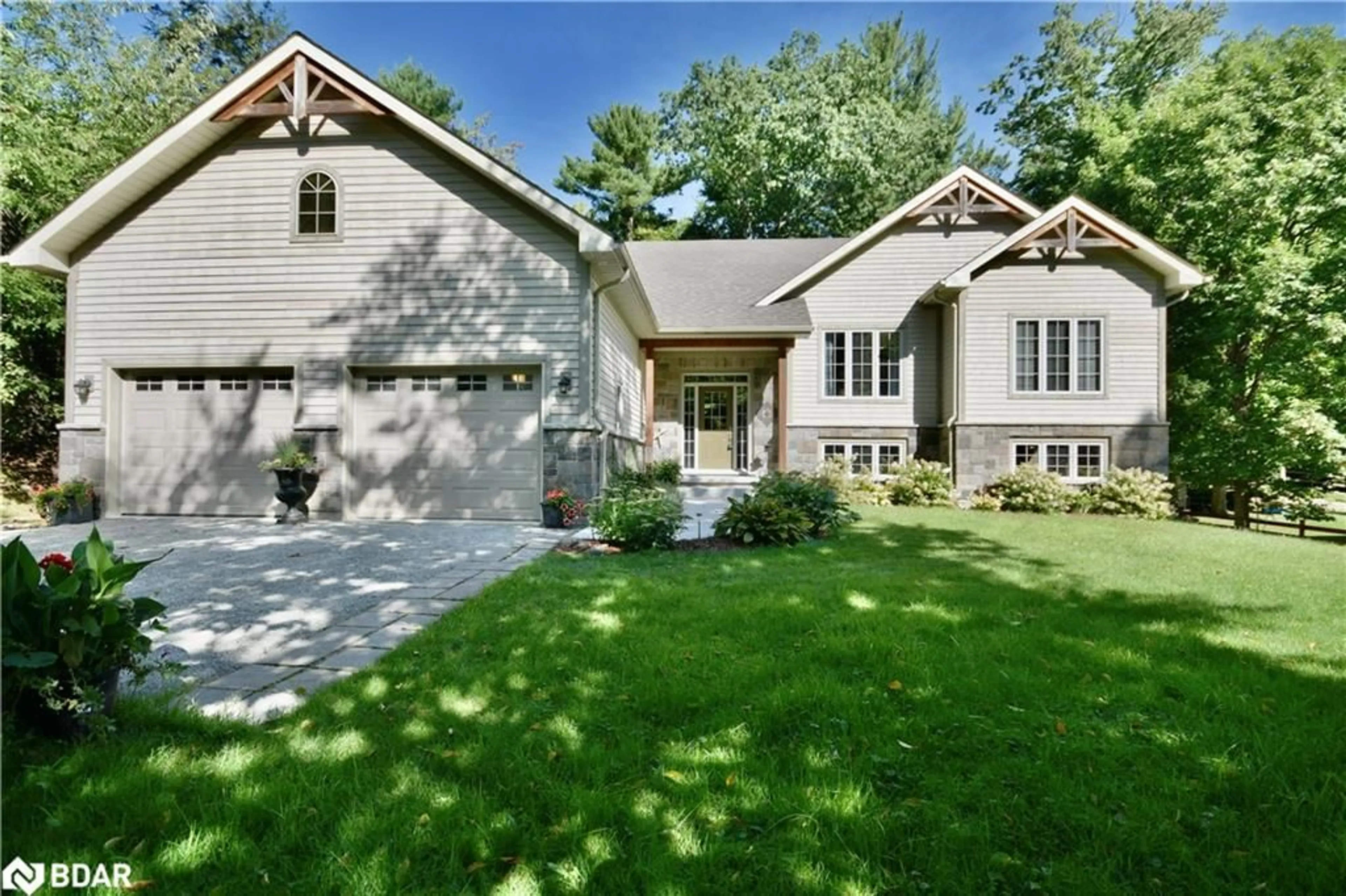 Frontside or backside of a home, cottage for 16 Macedonia Cir, Tiny Ontario L9M 0H9