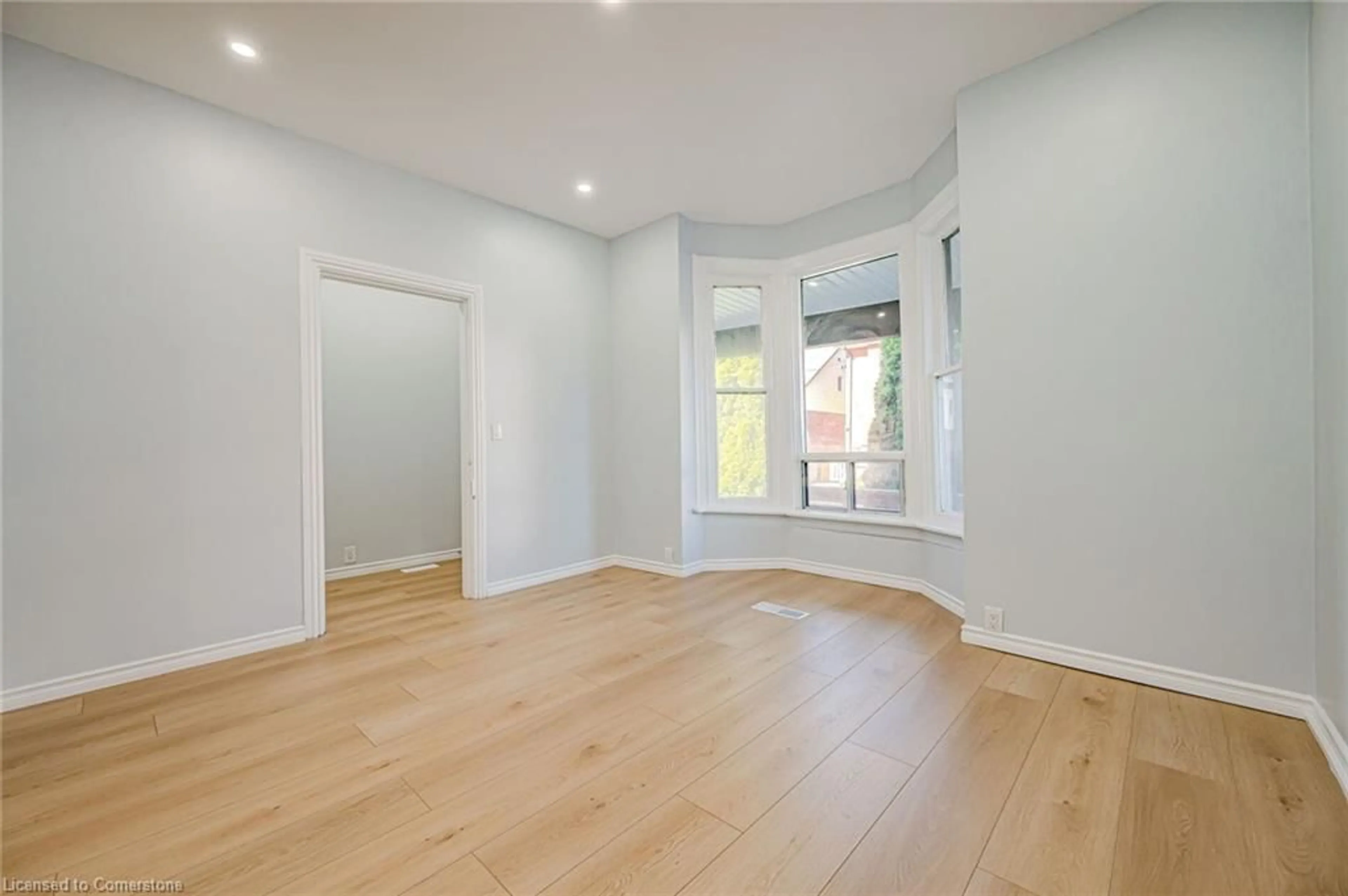 A pic of a room, wood floors for 294 Emerald St, Hamilton Ontario L8L 5L3