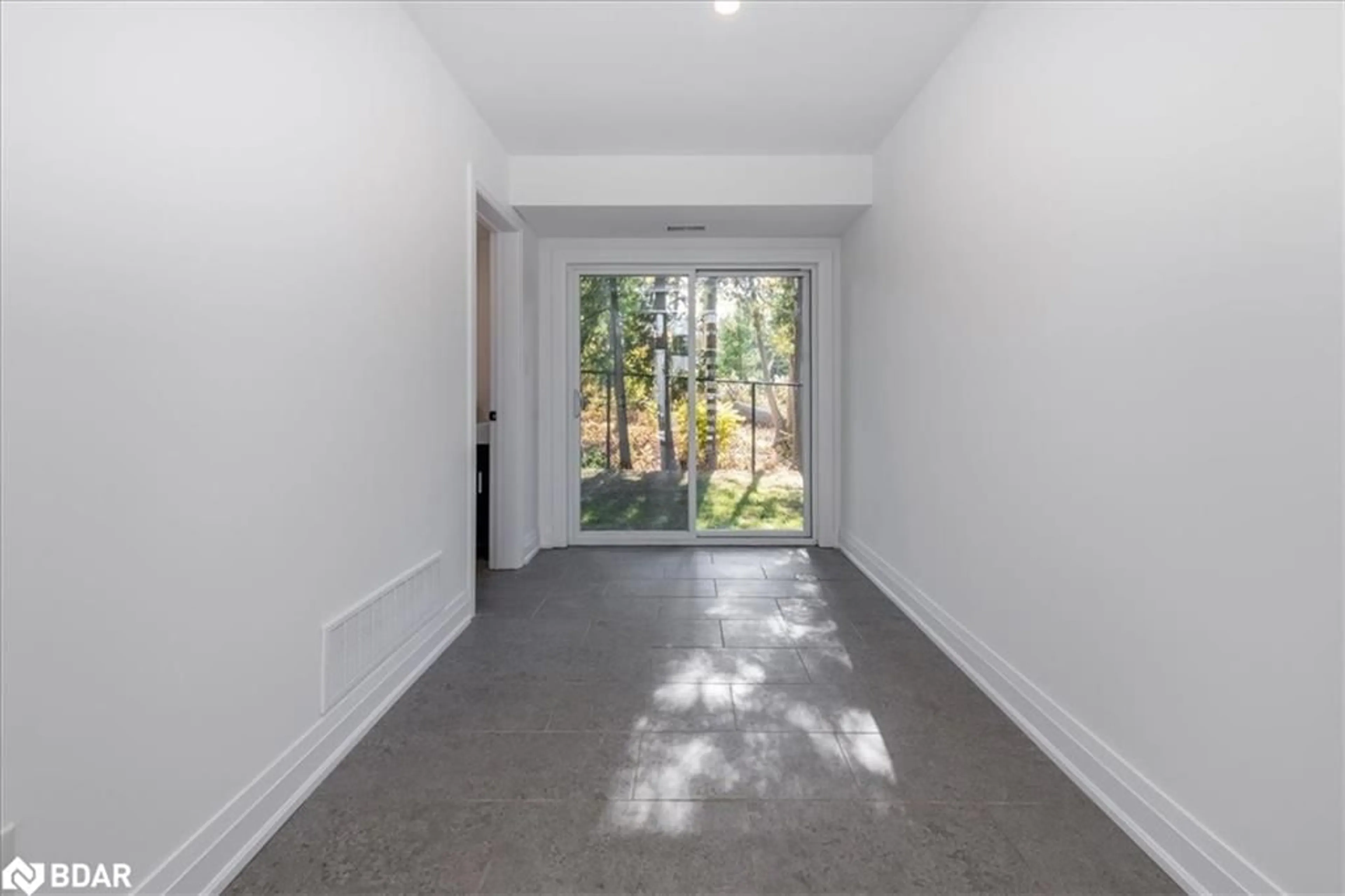 Indoor entryway, cement floor for 1117 Stoney Point Rd, Lefroy Ontario L0L 1W0