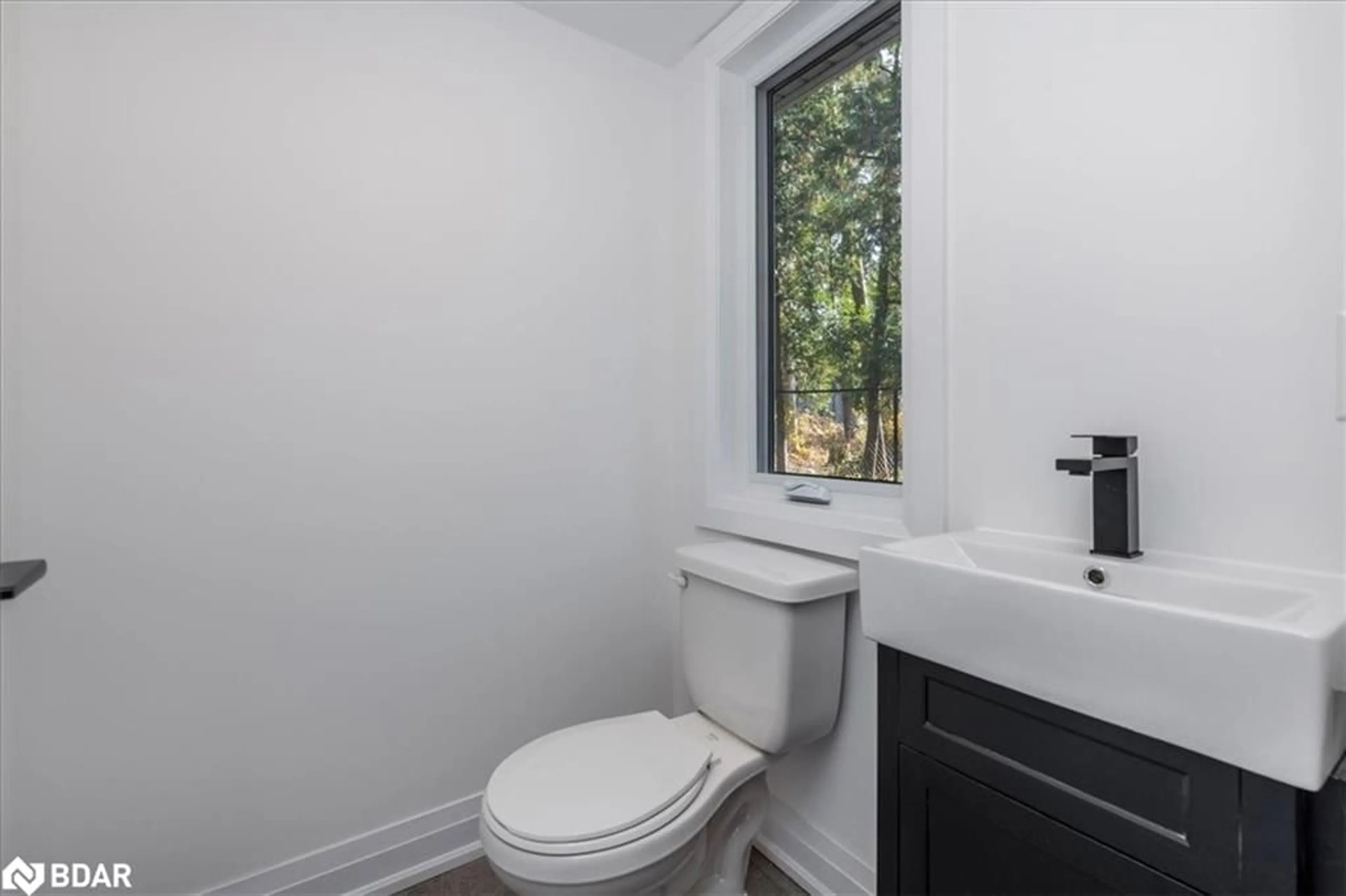 Standard bathroom, wood floors for 1117 Stoney Point Rd, Lefroy Ontario L0L 1W0