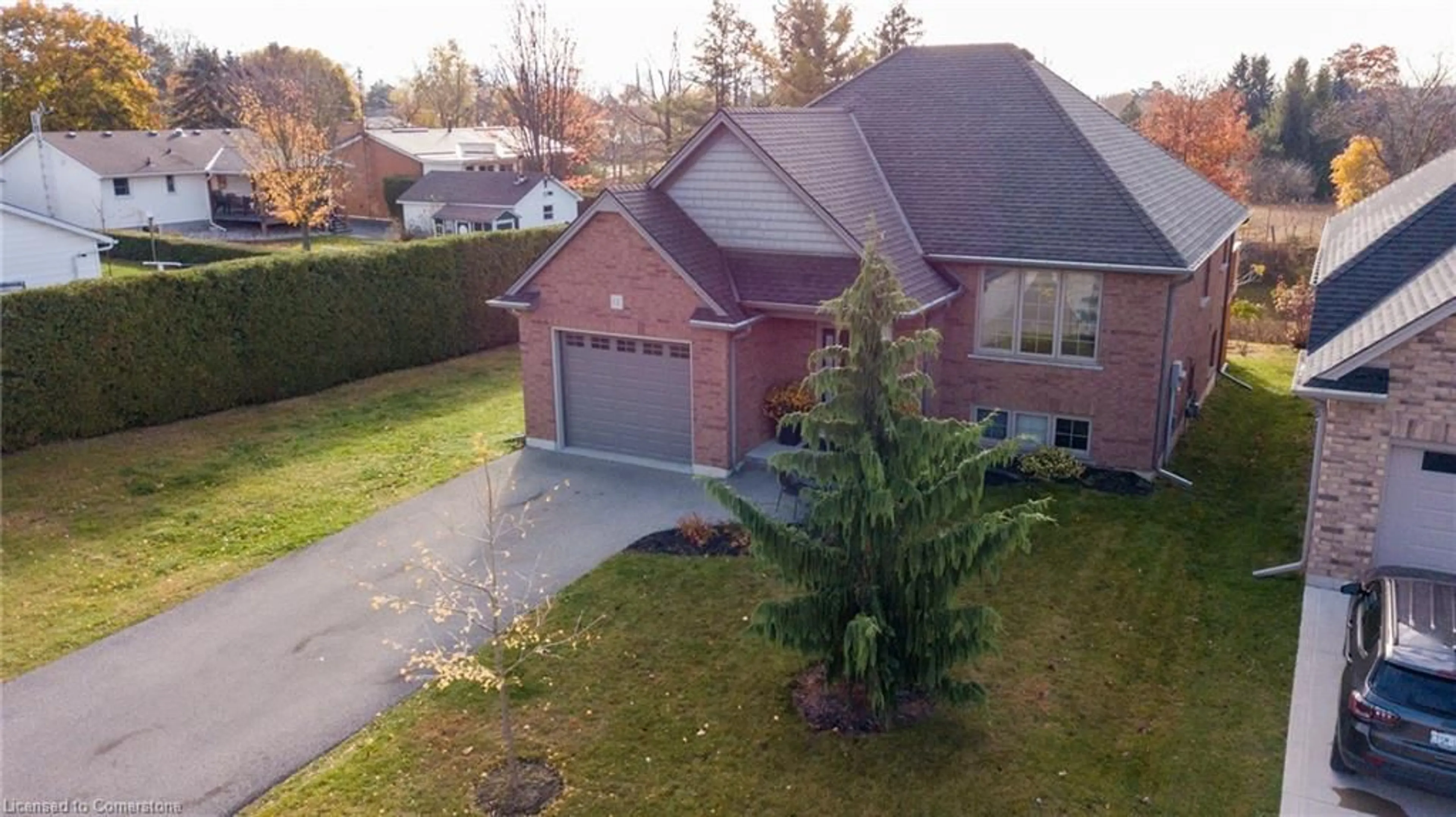 Frontside or backside of a home, the street view for 12 Cottonwood St, Waterford Ontario N0E 1Y0