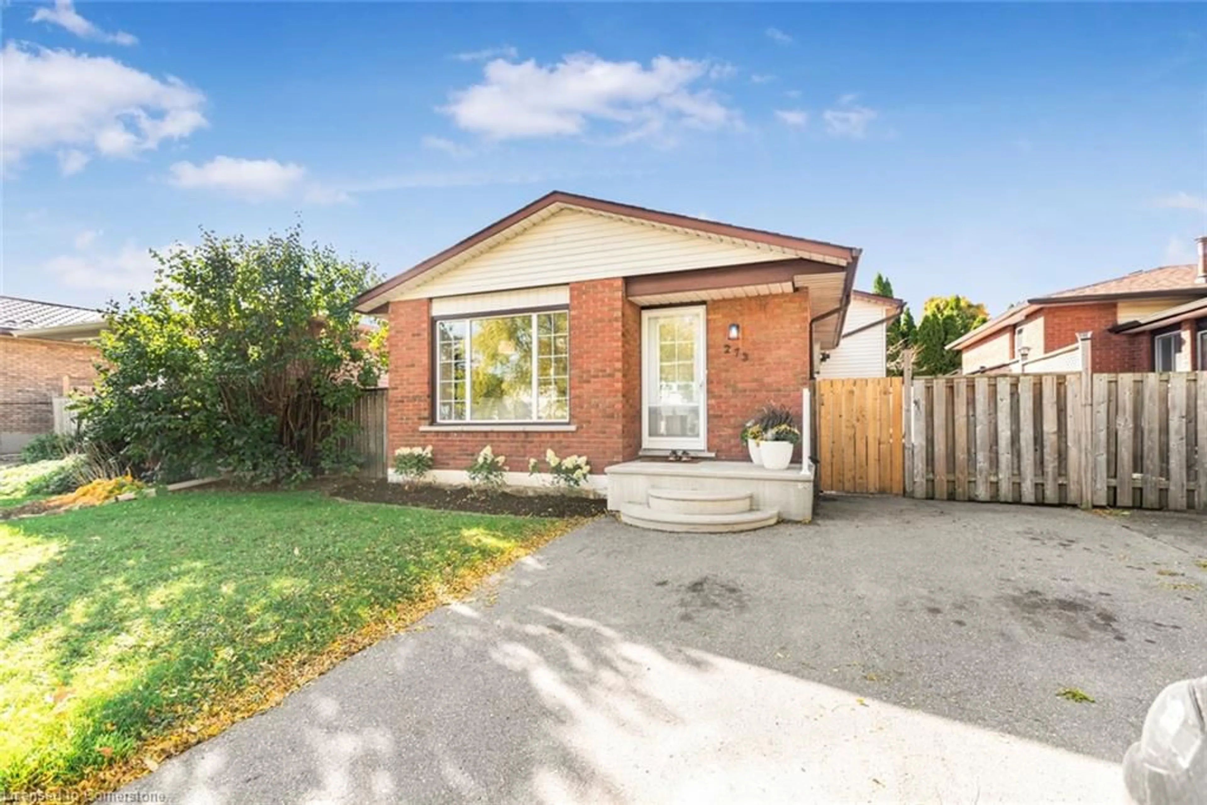 Frontside or backside of a home, the fenced backyard for 273 Bonaventure Dr, Hamilton Ontario L9C 7B2