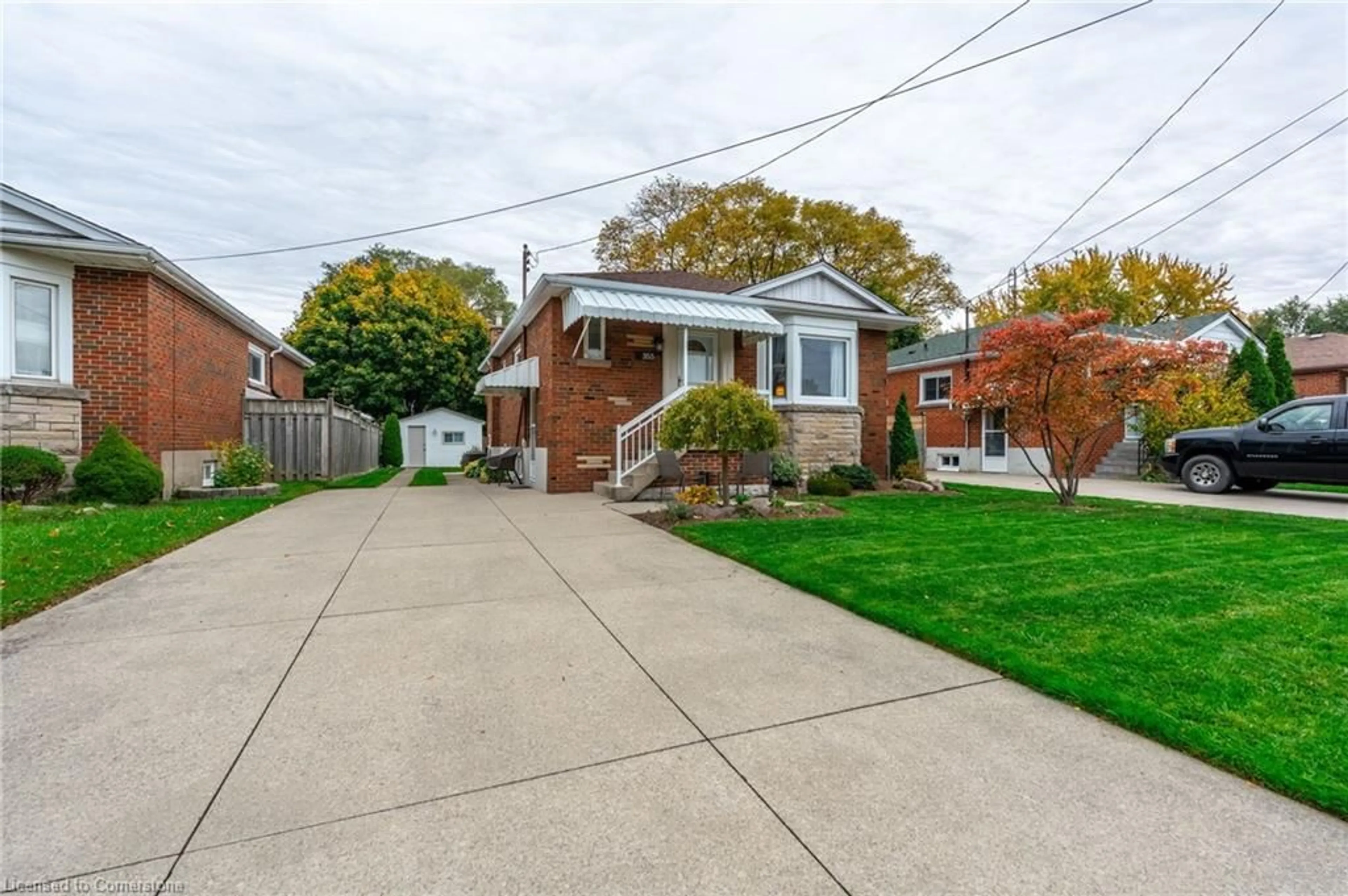 Frontside or backside of a home, the street view for 355 East 34th St, Hamilton Ontario L8V 3X4