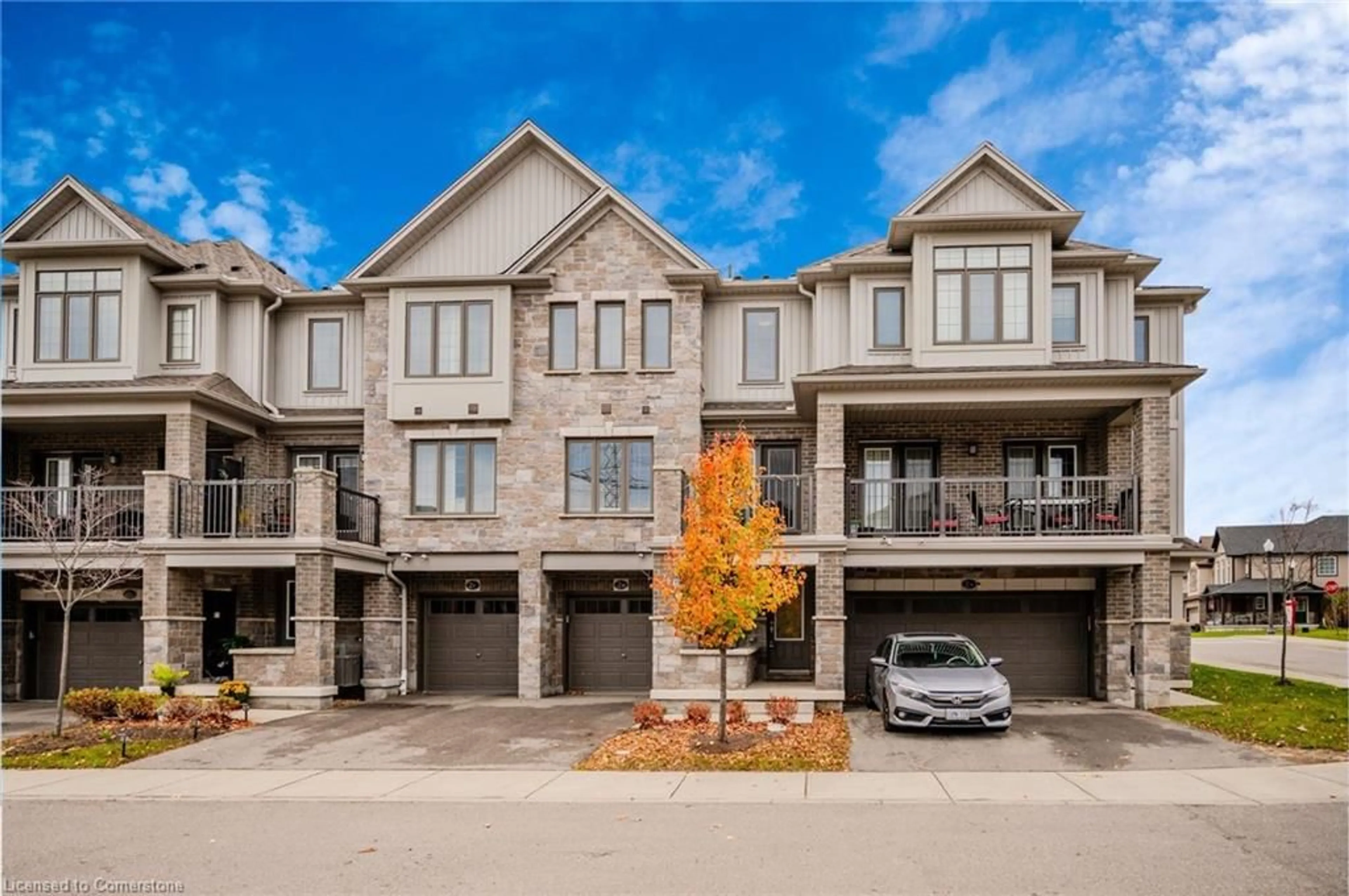 A pic from exterior of the house or condo, the street view for 115 South Creek Dr #2B, Kitchener Ontario N2P 0H2