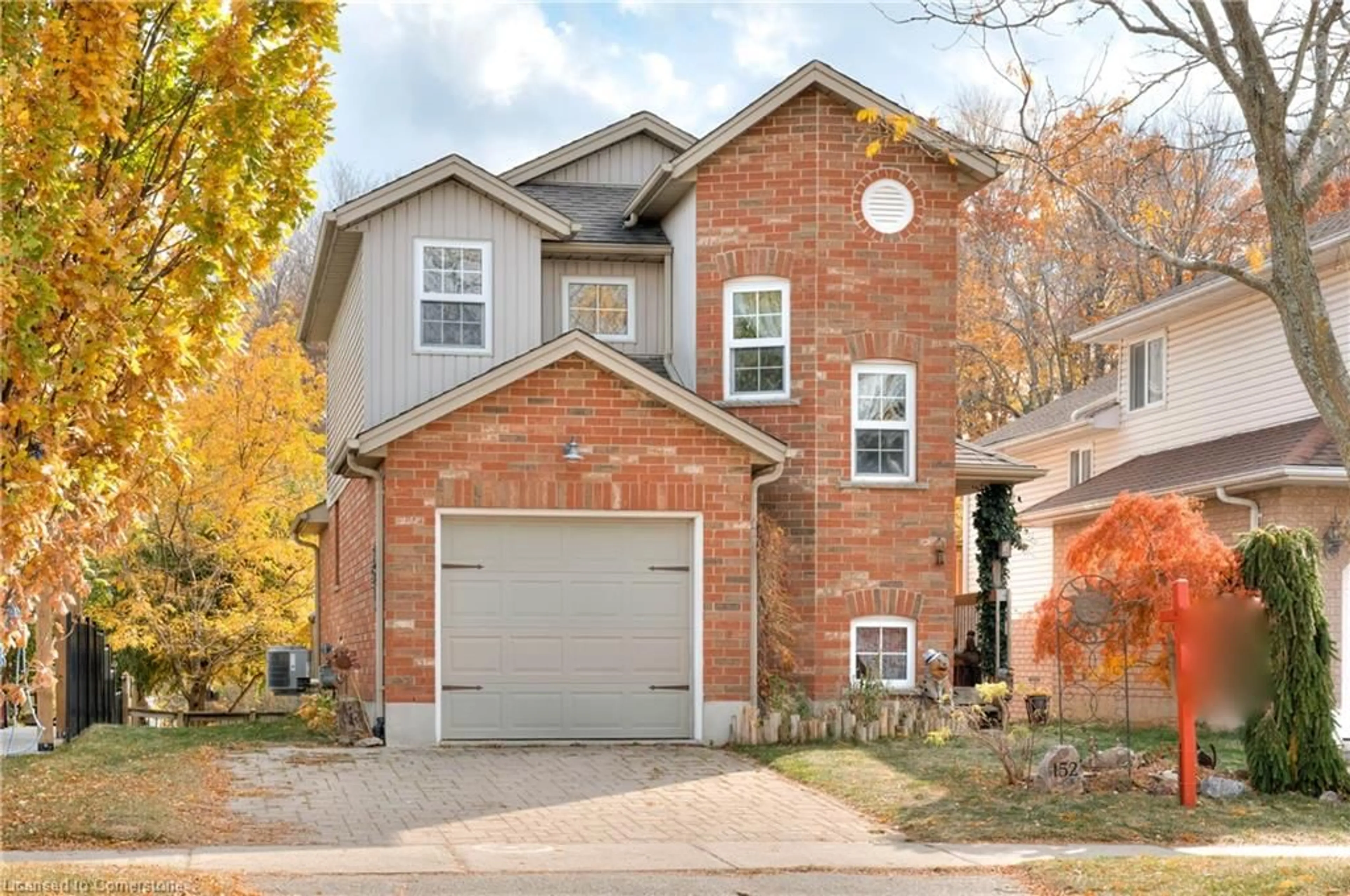 Home with brick exterior material for 152 Bush Clover Cres, Kitchener Ontario N2E 3P8