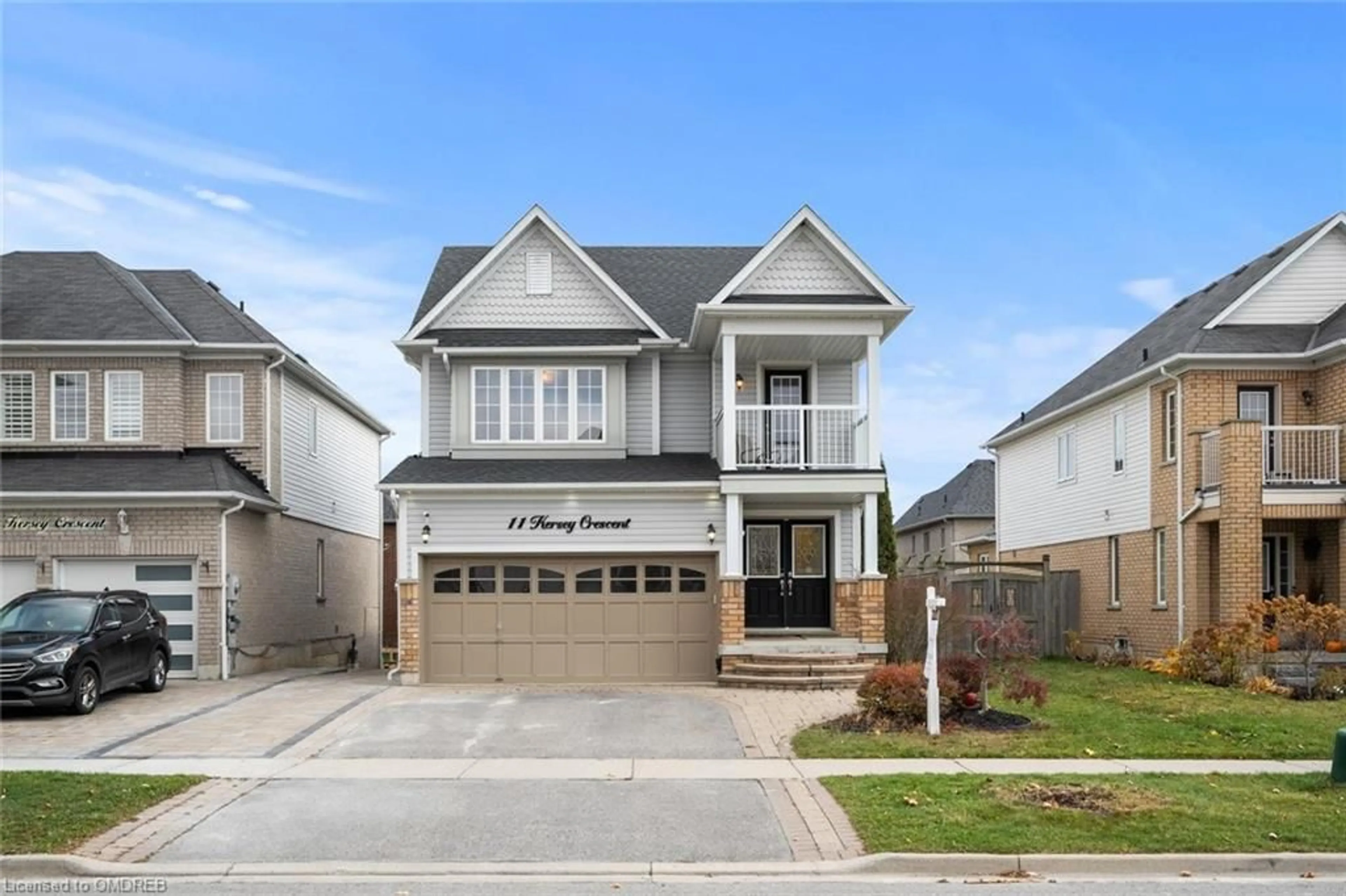 Frontside or backside of a home, the street view for 11 Kersey Cres, Courtice Ontario L1E 0A5