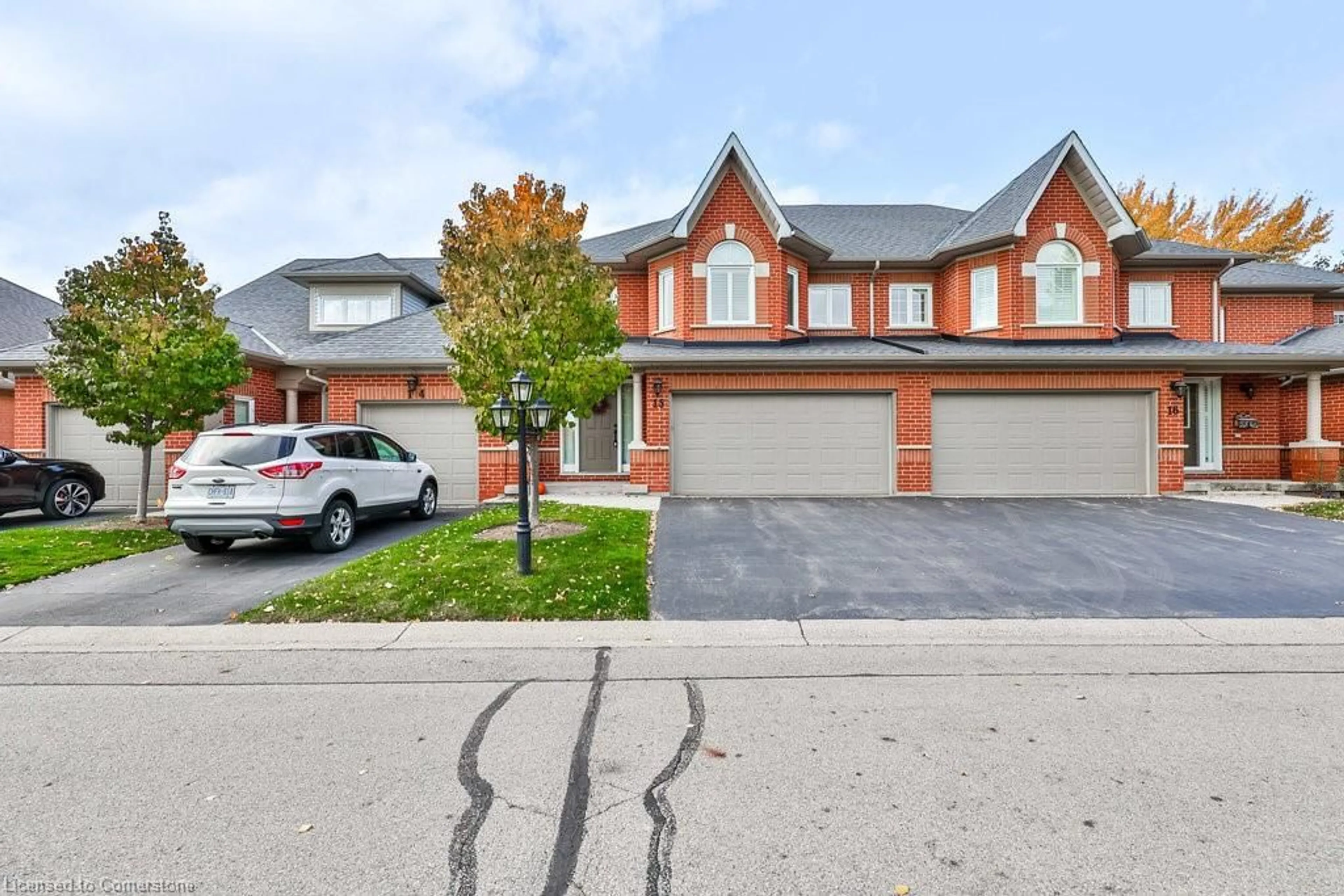 A pic from exterior of the house or condo, the street view for 2165 Country Club Dr #15, Burlington Ontario L7M 4H4