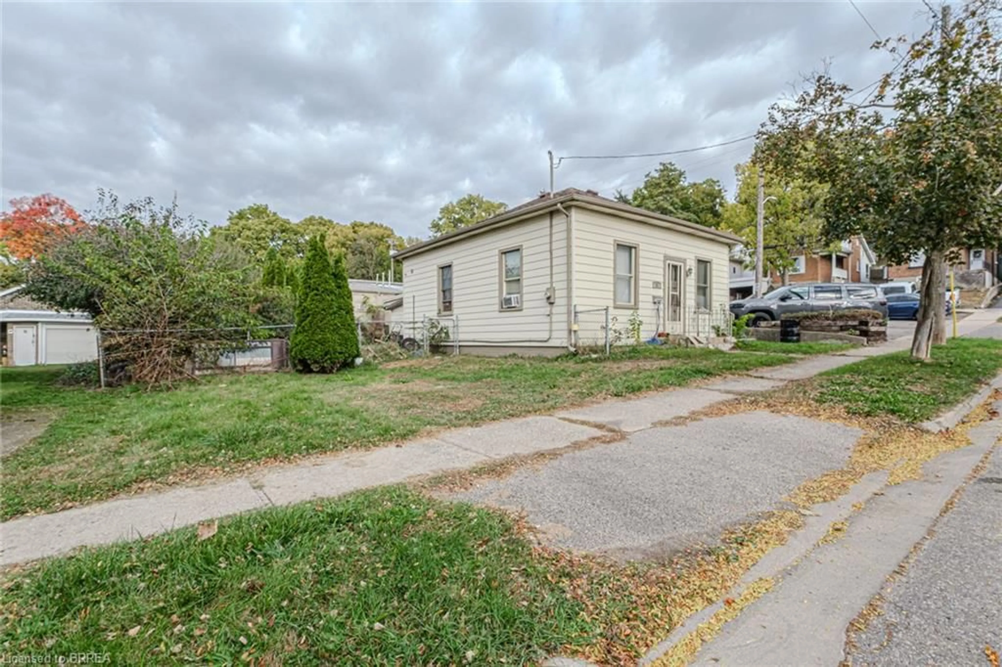 Frontside or backside of a home, the street view for 12 Ann St, Brantford Ontario N3R 3X8