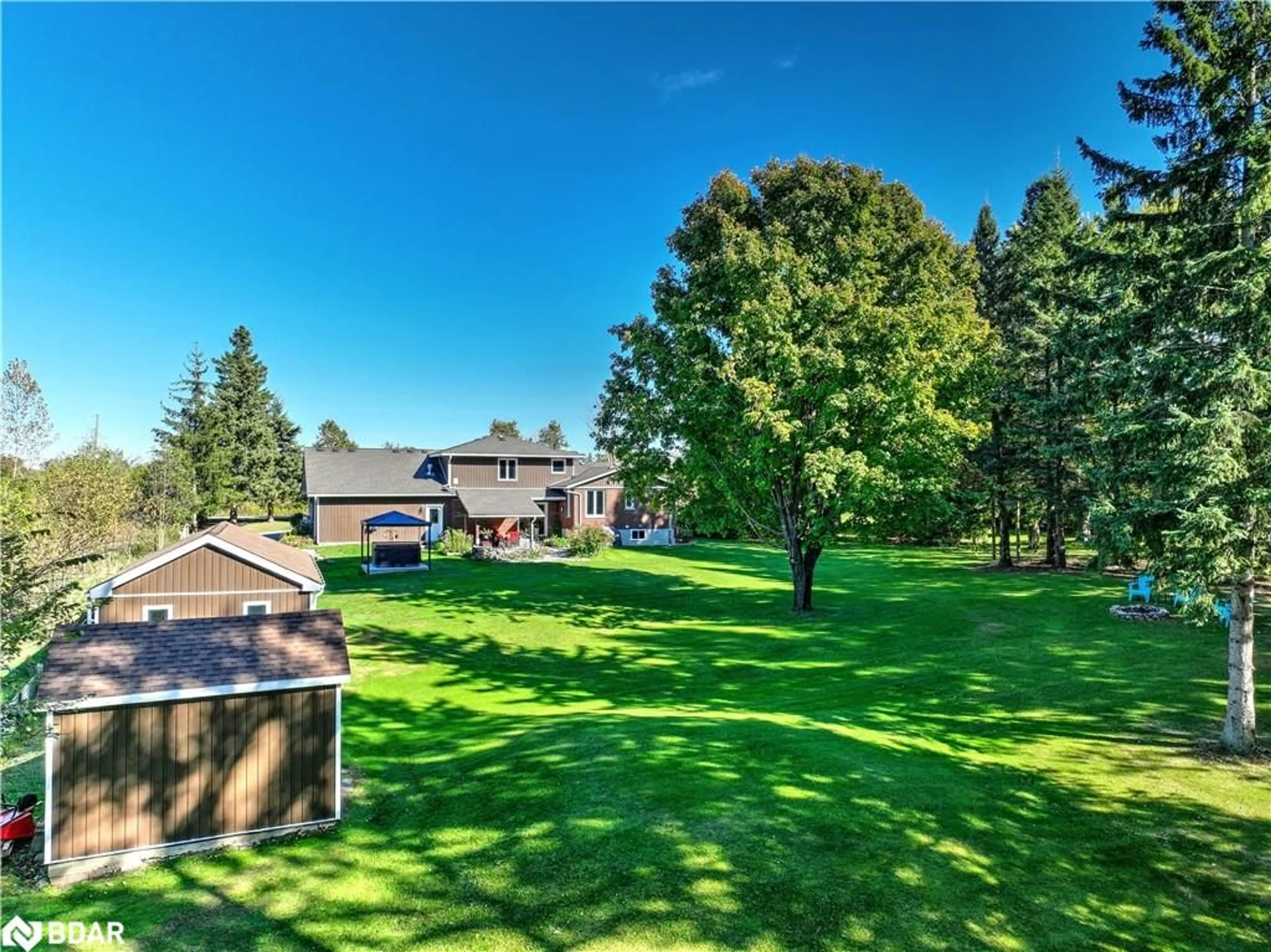 A pic from exterior of the house or condo, the fenced backyard for 33 Northline Rd, Fenelon Falls Ontario K0M 1N0