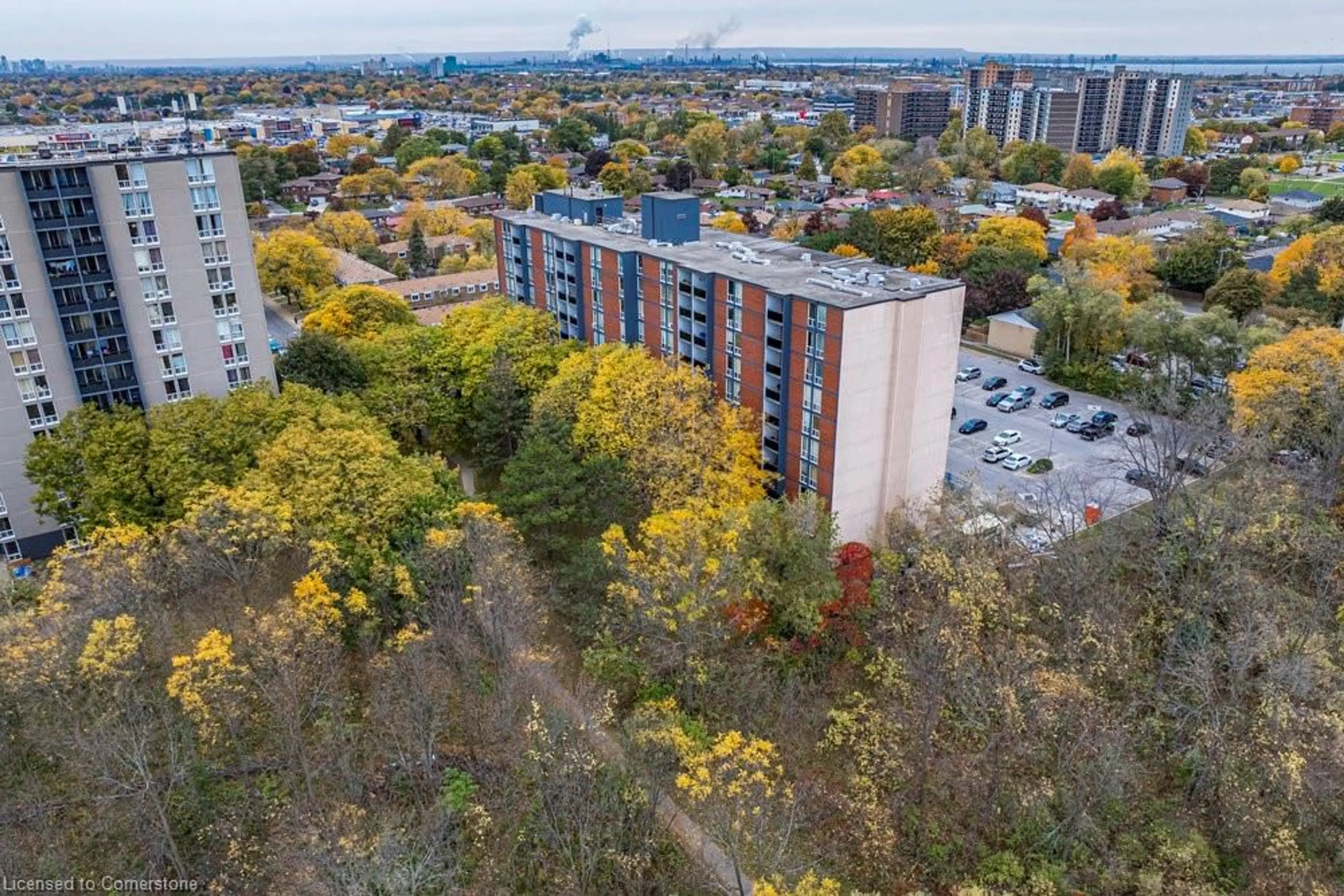 A pic from exterior of the house or condo, the view of city buildings for 75 Glenburn Crt #409, Hamilton Ontario L8E 1C7