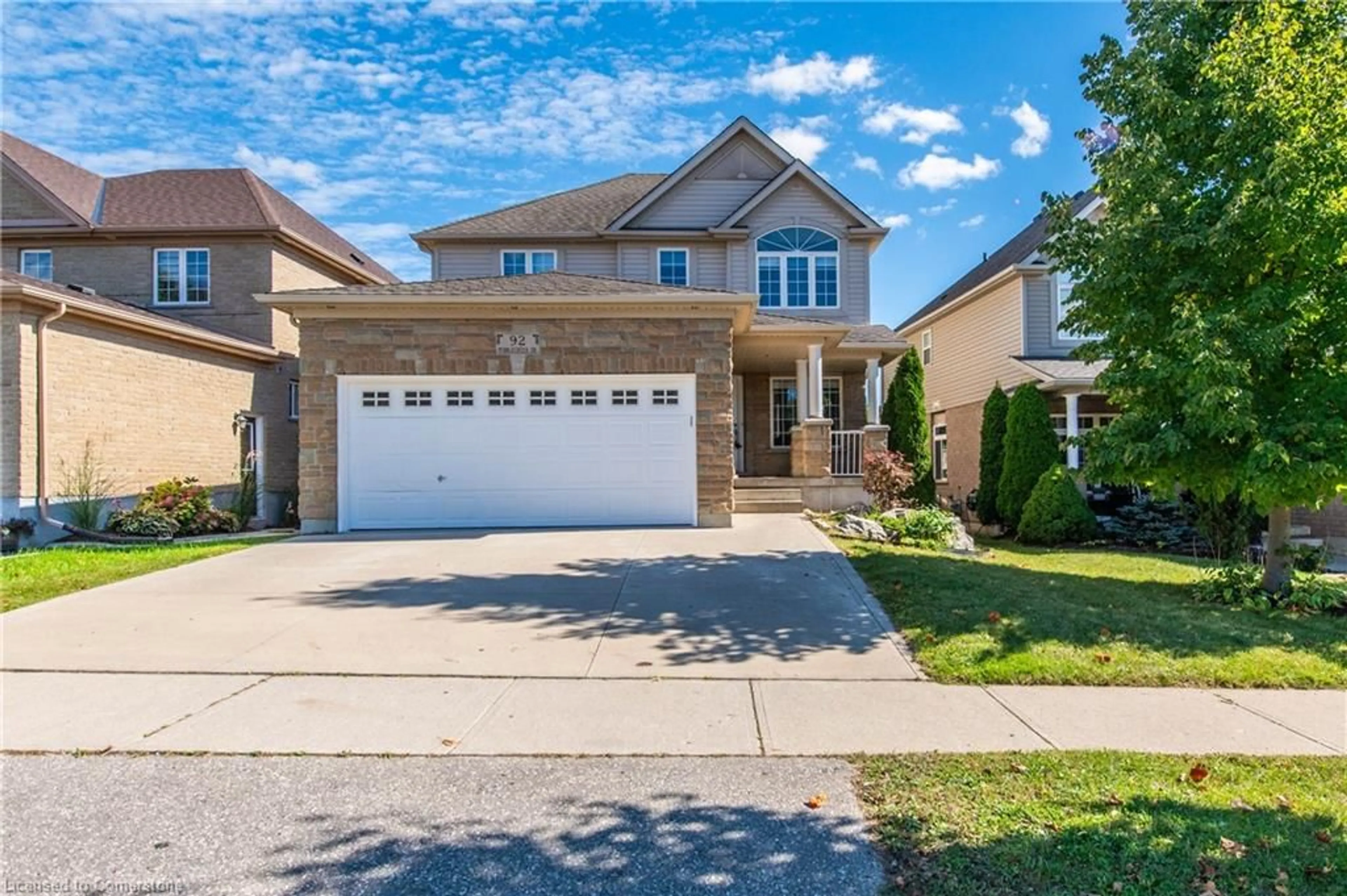 Frontside or backside of a home, the street view for 92 Pebblecreek Dr, Kitchener Ontario N2A 4M5