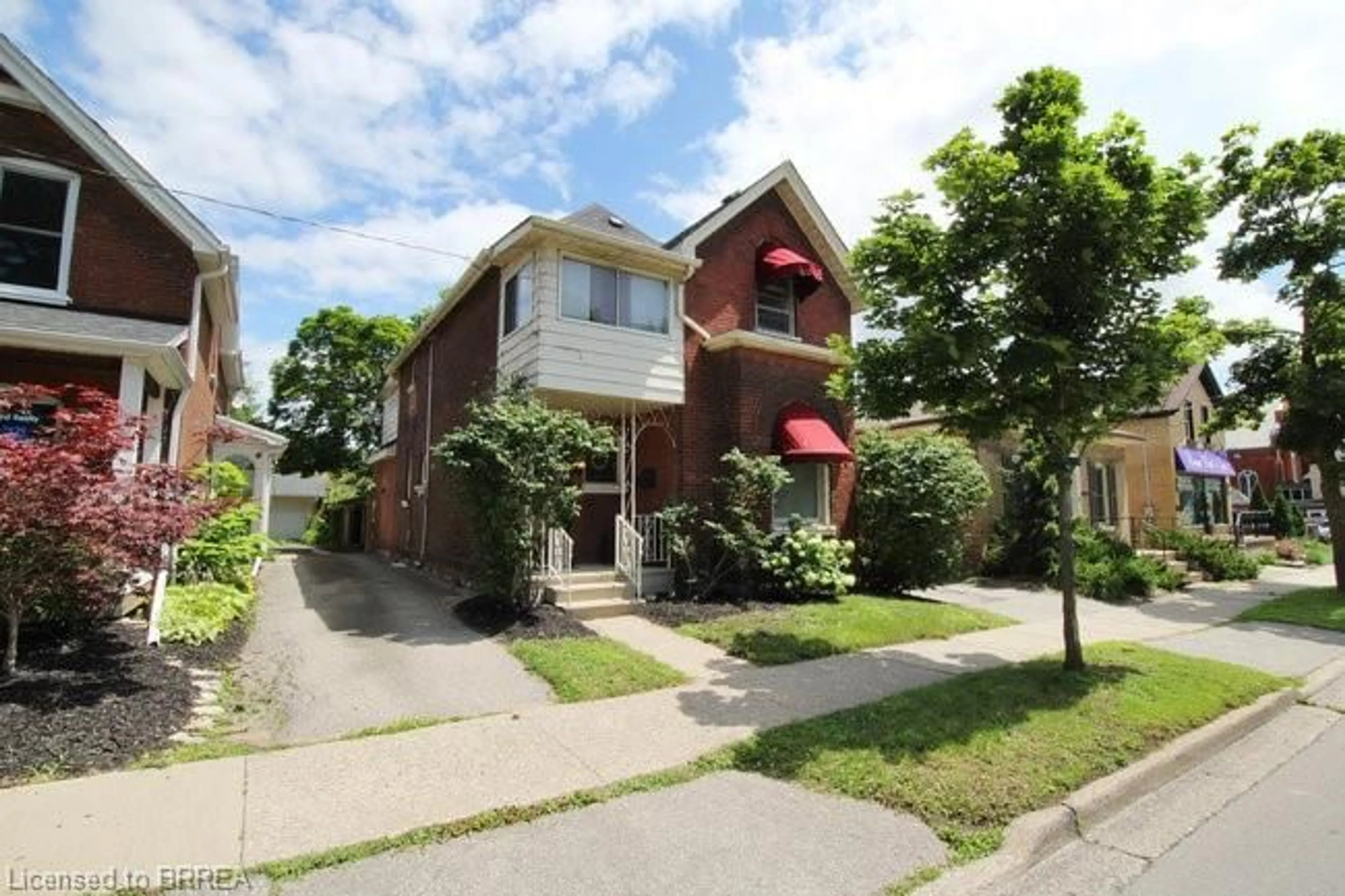 Frontside or backside of a home, the street view for 243 Brant Ave, Brantford Ontario N3T 3J4