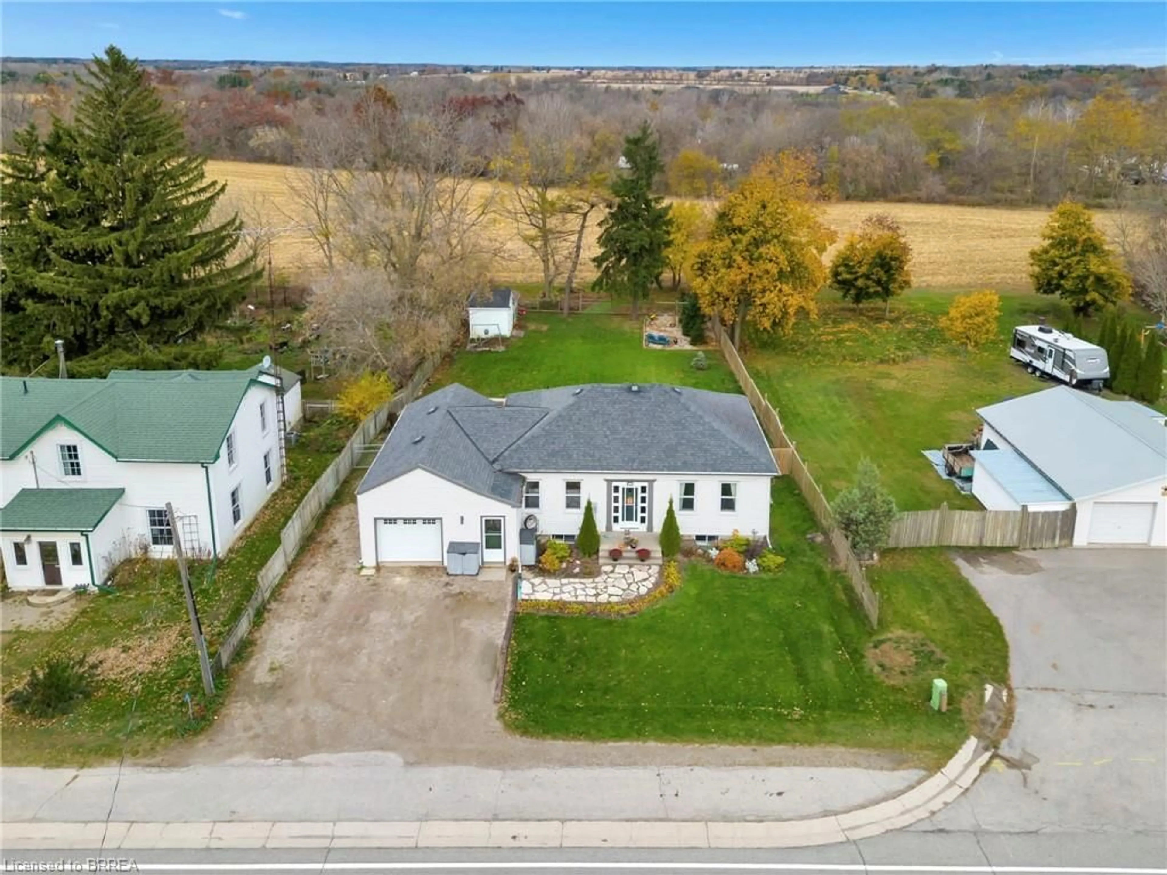 Frontside or backside of a home, the fenced backyard for 1283 Colborne St, Mount Vernon Ontario N3T 5L7