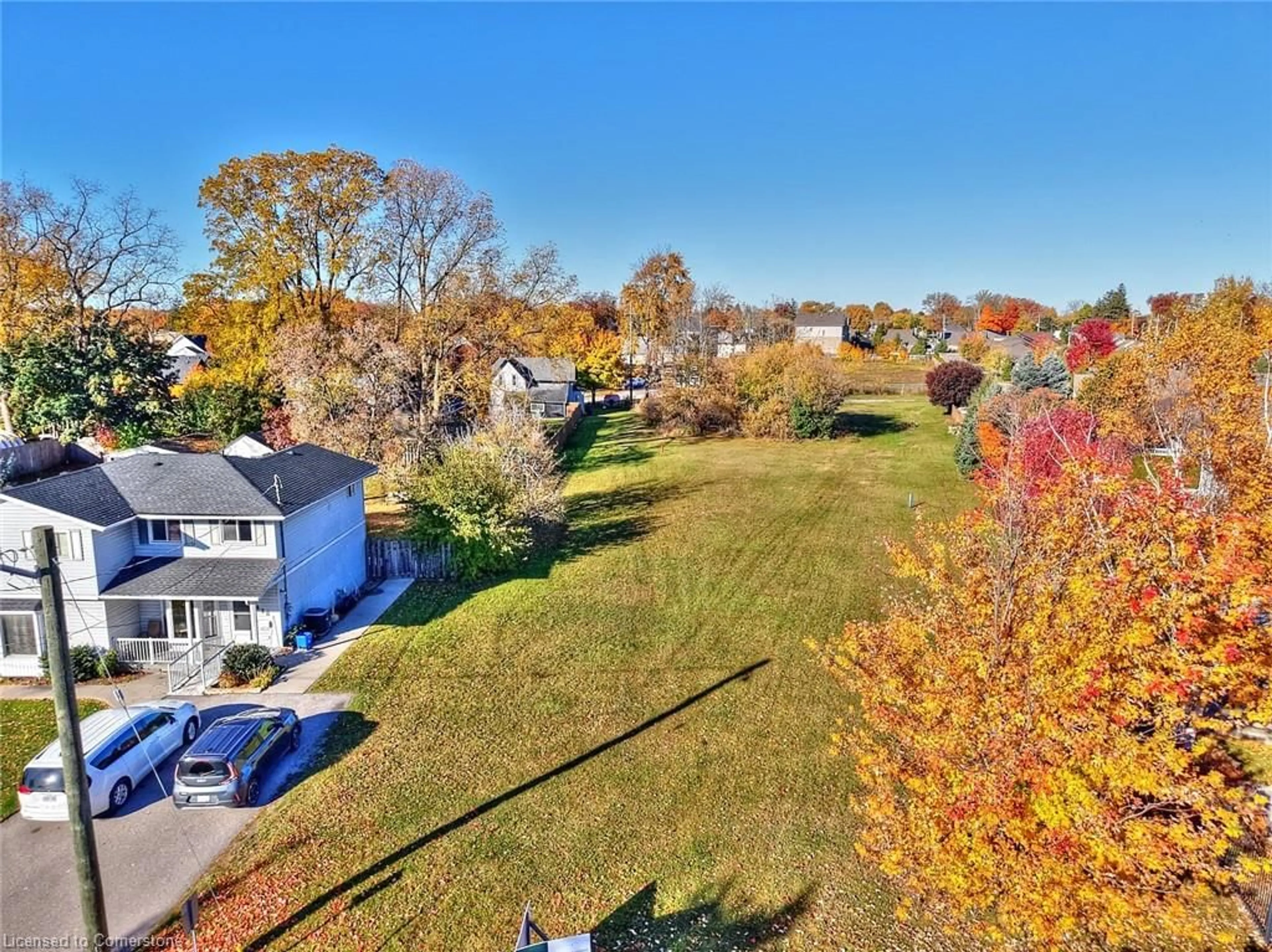 A pic from exterior of the house or condo, the fenced backyard for 444 Tamarac St, Dunnville Ontario N1A 2C9