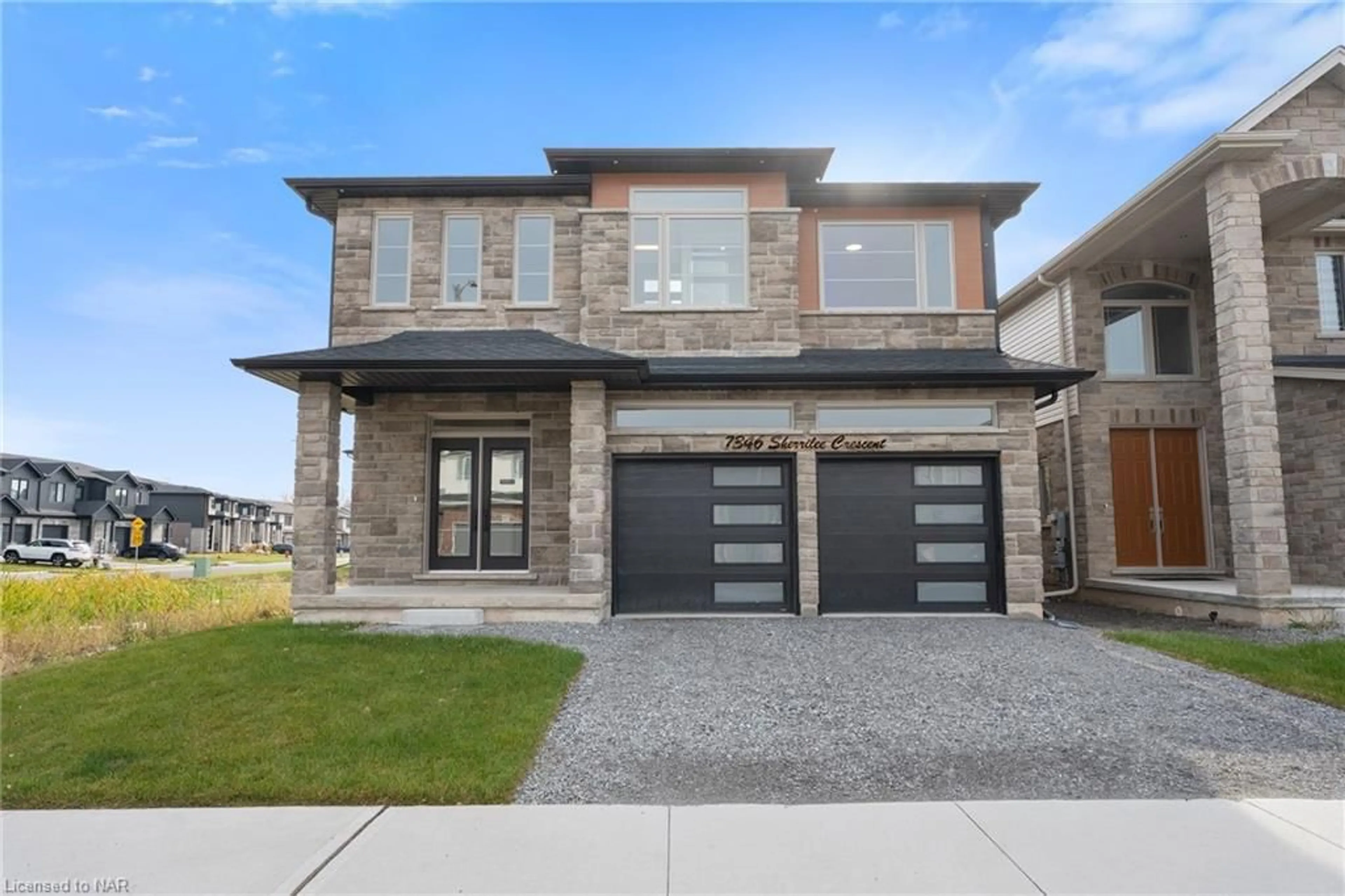 Home with brick exterior material for 7346 Sherrilee Cres, Niagara Falls Ontario L2H 2Y6